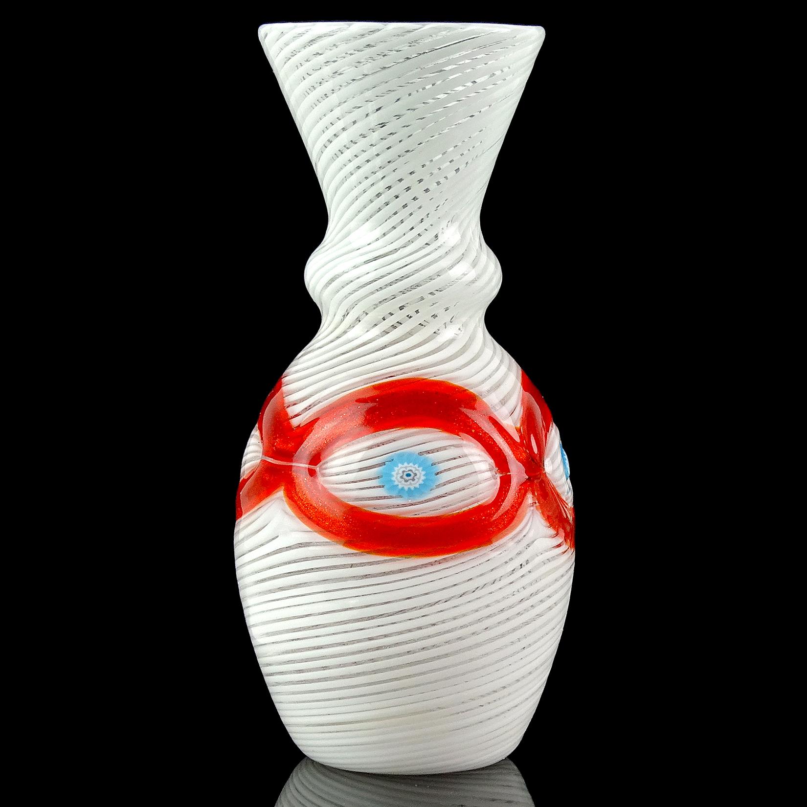 Beautiful vintage Murano hand blown white Filigrana ribbons, red-orange aventurine and blue millefiori canes Italian art glass cabinet vase. Documented to Salviati & Co., with intact original label still attached. It reads 