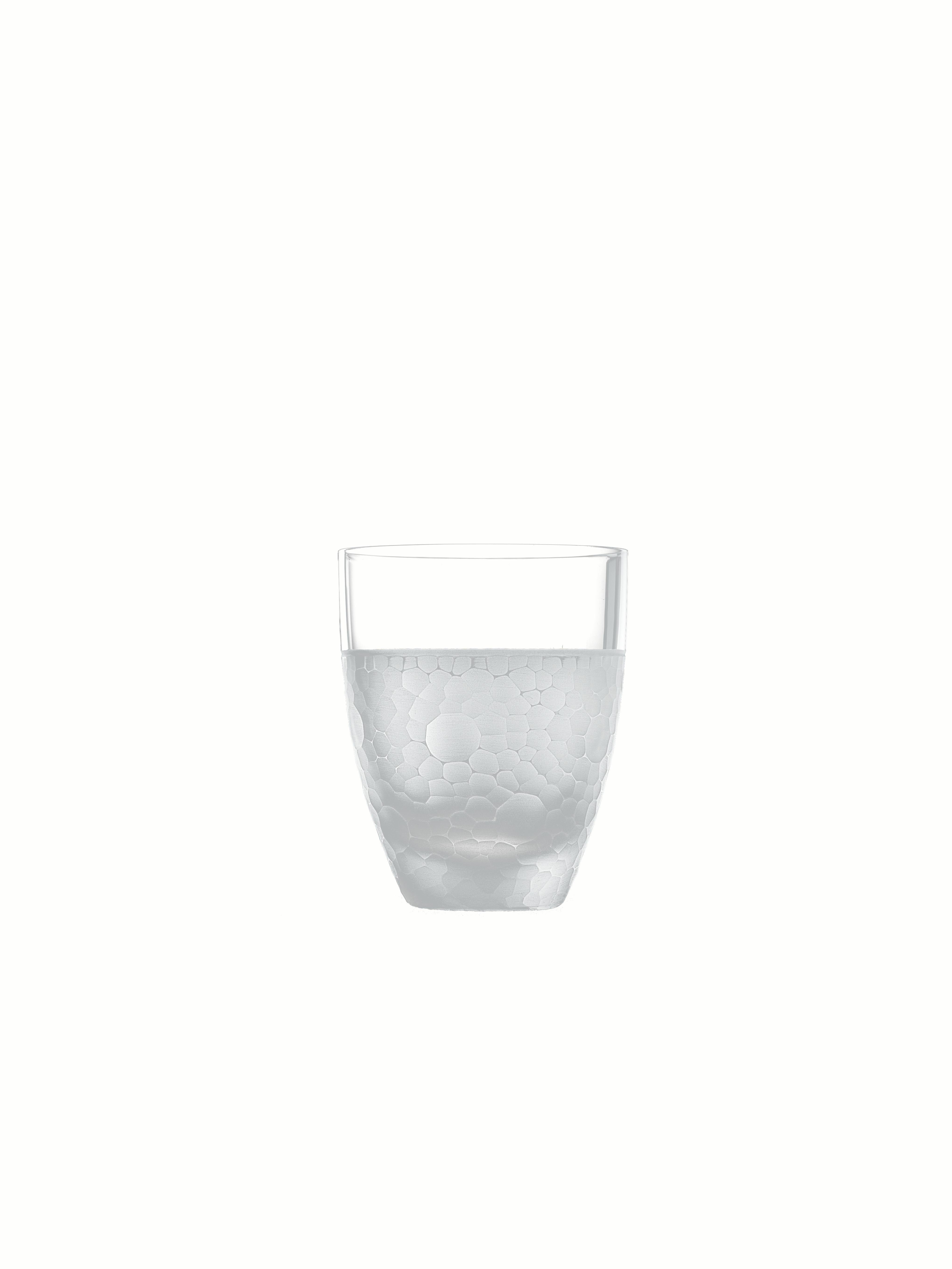 Every piece stands for its refined, contemporary style. Six different decorations, obtained by superficial grinding, vary from simple geometric patterns to elegant hammered effects.

Additional information:
Material: Glass
Dimensions: Ø 8.2 x 10