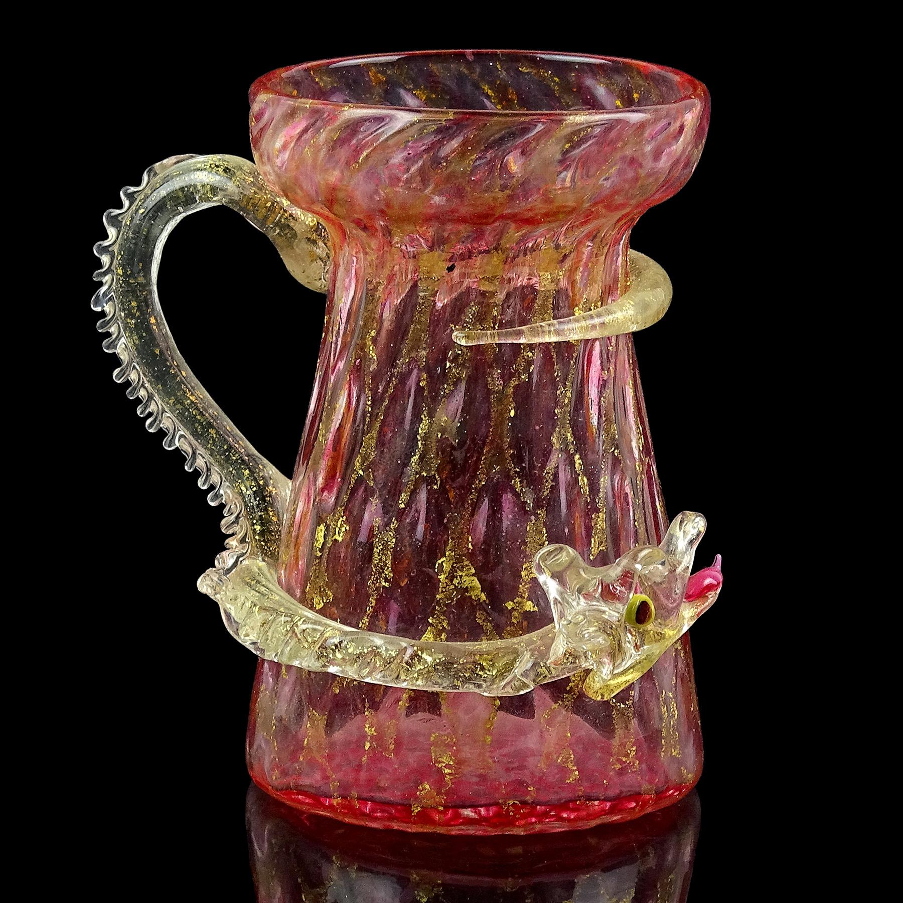 Beautiful, rare antique early Venetian pink with gold leaf Italian art glass sea serpent or dragon mini vase. The piece is attributed to the Salviati Dott. Company, mid-1800s. The surface has a quilted diamond pattern that is a little bit raised, so