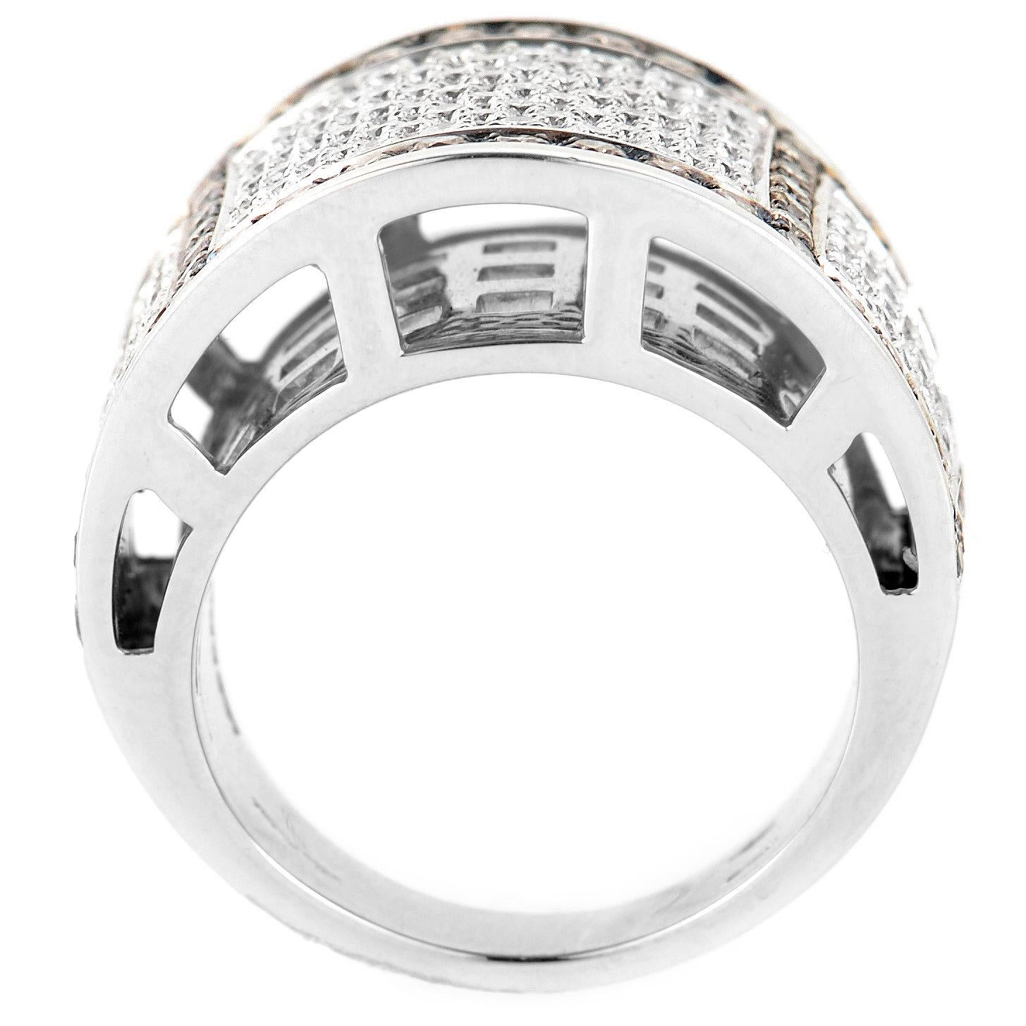 This band ring from Salvini is sensual and shimmers with diamonds. It is made of 18K white gold and is set with a luxurious diamond pave comprised of ~2.75ct of cognac and white diamonds.
