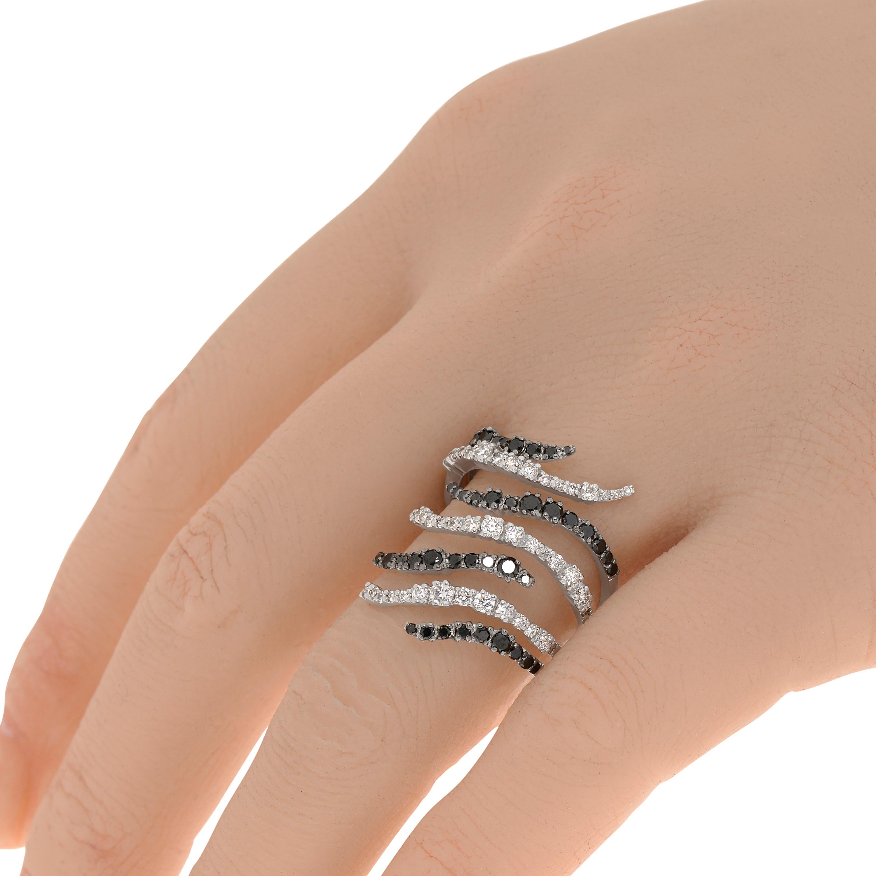 Salvini 18K white gold highway ring features glistening waves of 1.56ct. tw. black and white diamonds. Diamond clarity: VS/SI. Diamond color: G-H. The ring size is 6.5 (53.1). The decoration size is 30mm x 30mm. The weight is 8g.
