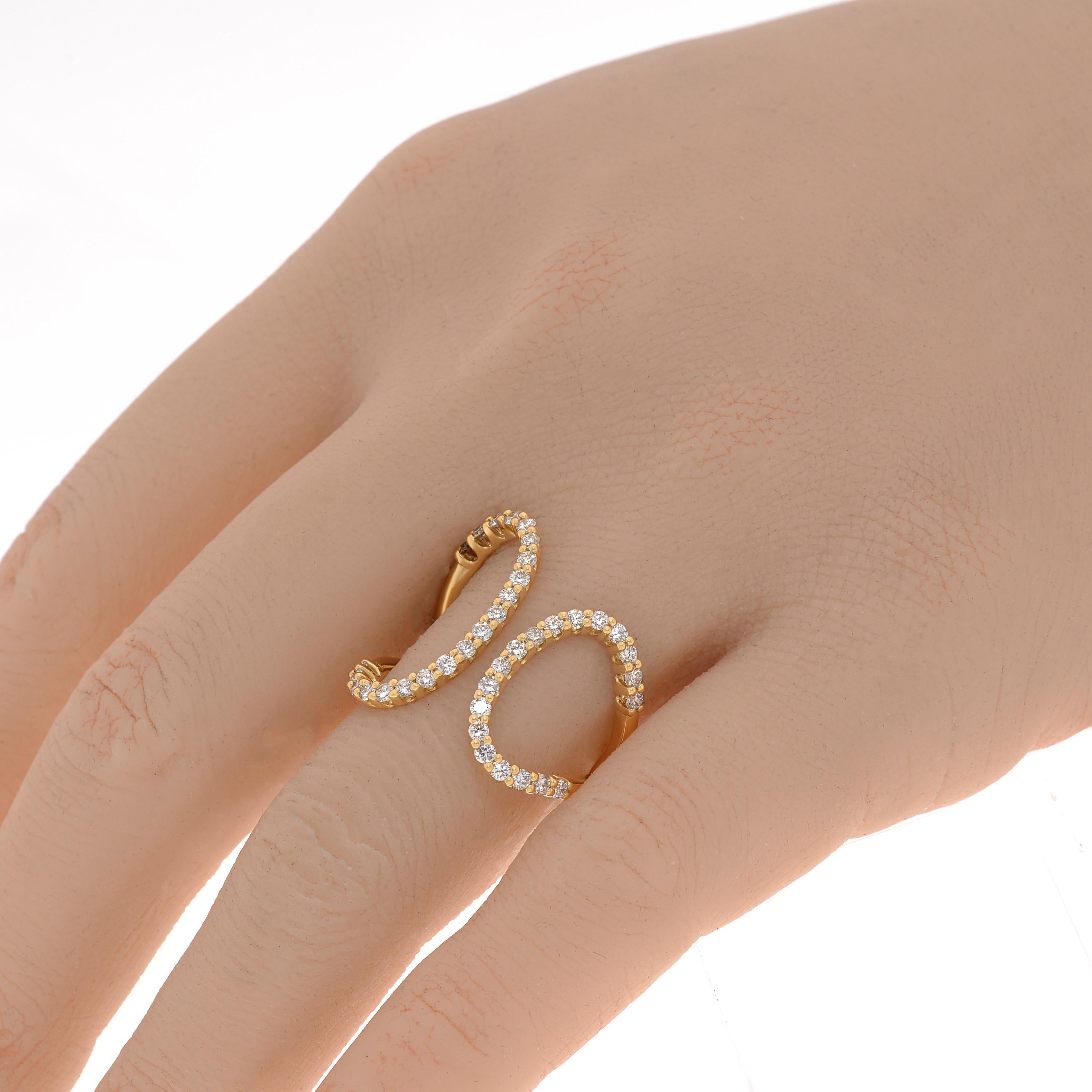 This sparkling Salvini 18K yellow gold Wrap ring features a modern design of 0.70ct. tw. diamonds in a fishtail setting. Diamond clarity: VS/SI. Diamond color: G-H. The ring size is 6.5 (53.1). The band width is 2mm. The weight is 4g.

