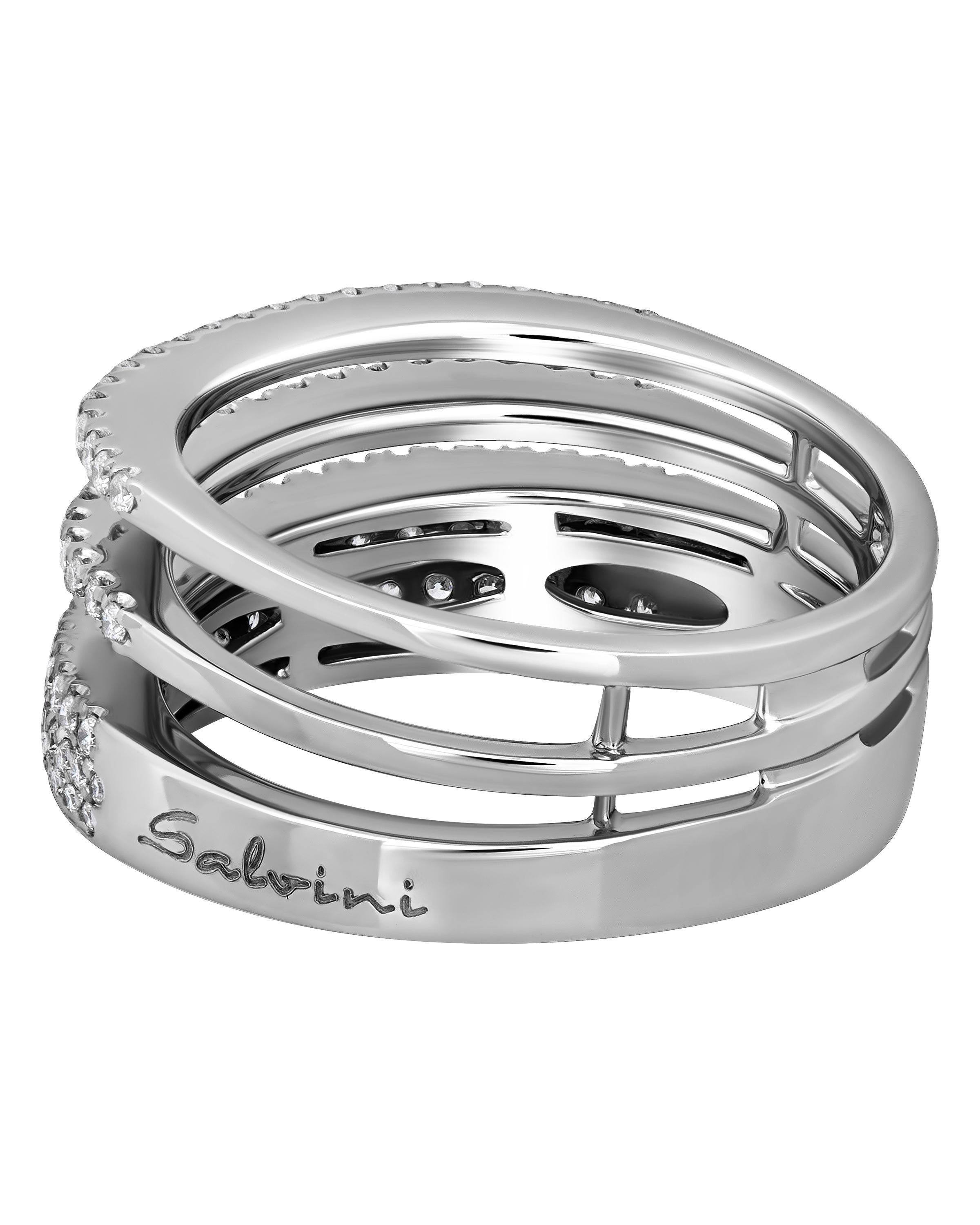 Salvini 18K white gold puzzle ring features three bands adorned with diamonds 0.55ct. tw. The ring size is 7.75. The band width is 7.1mm. The weight is 8g. This designer jewelry is shipped with a Salvini Box.
