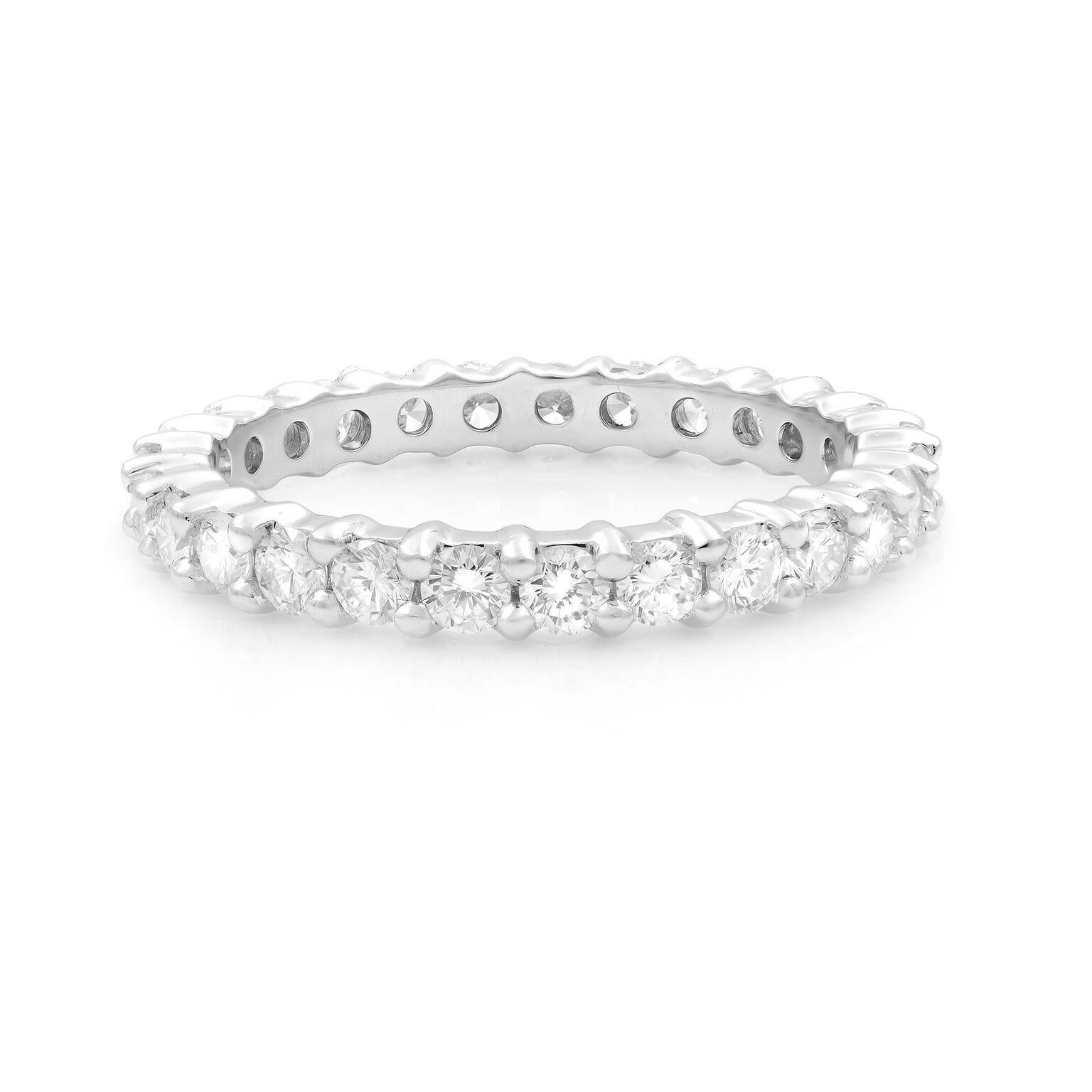 This is a stunning 18k white gold eternity band from Italian designer Salvini. It has a total of 1.32 carat of prong set round cut diamonds wrapped all the way around the band. The width of the ring is 2.80 mm. This ring would look stunning worn