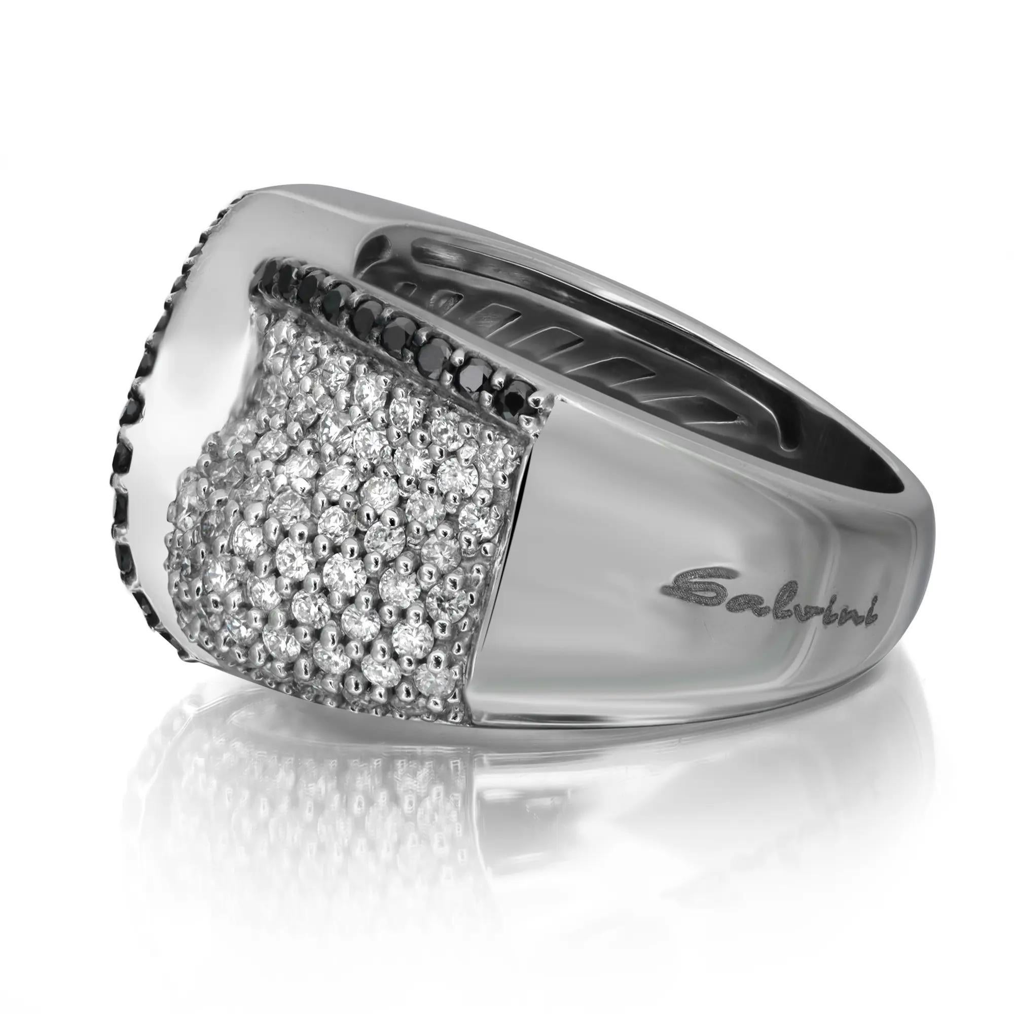 Shine bright with this diamond wide cocktail band ring. This ring showcases a polished look with its round-cut white and black diamonds in pave setting. Crafted in 18K white gold. Perfect gift for your loved ones. The width of the ring is 12.5 mm.
