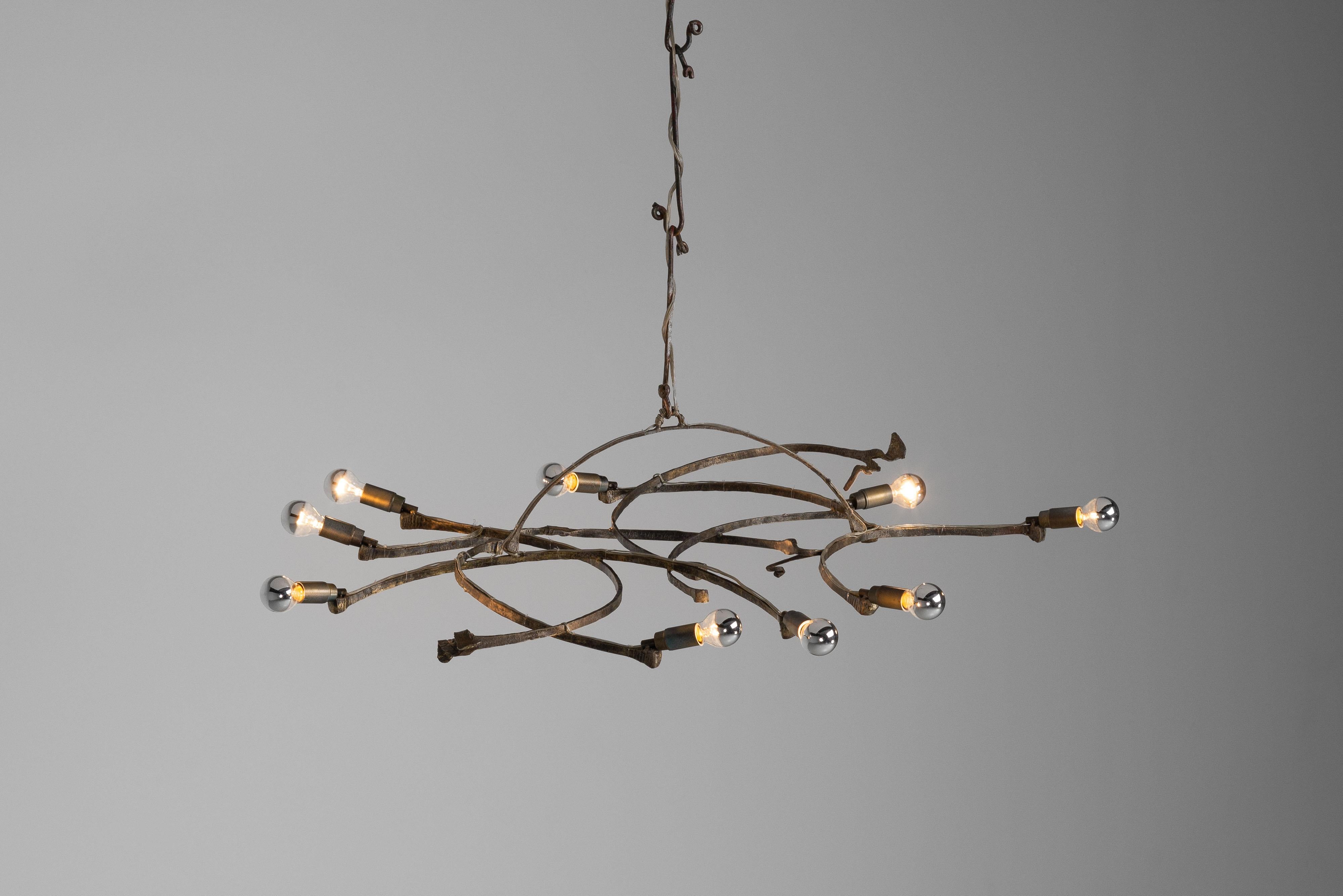 Wrought Iron Salvino Marsura chandelier made in Italy 1970 For Sale