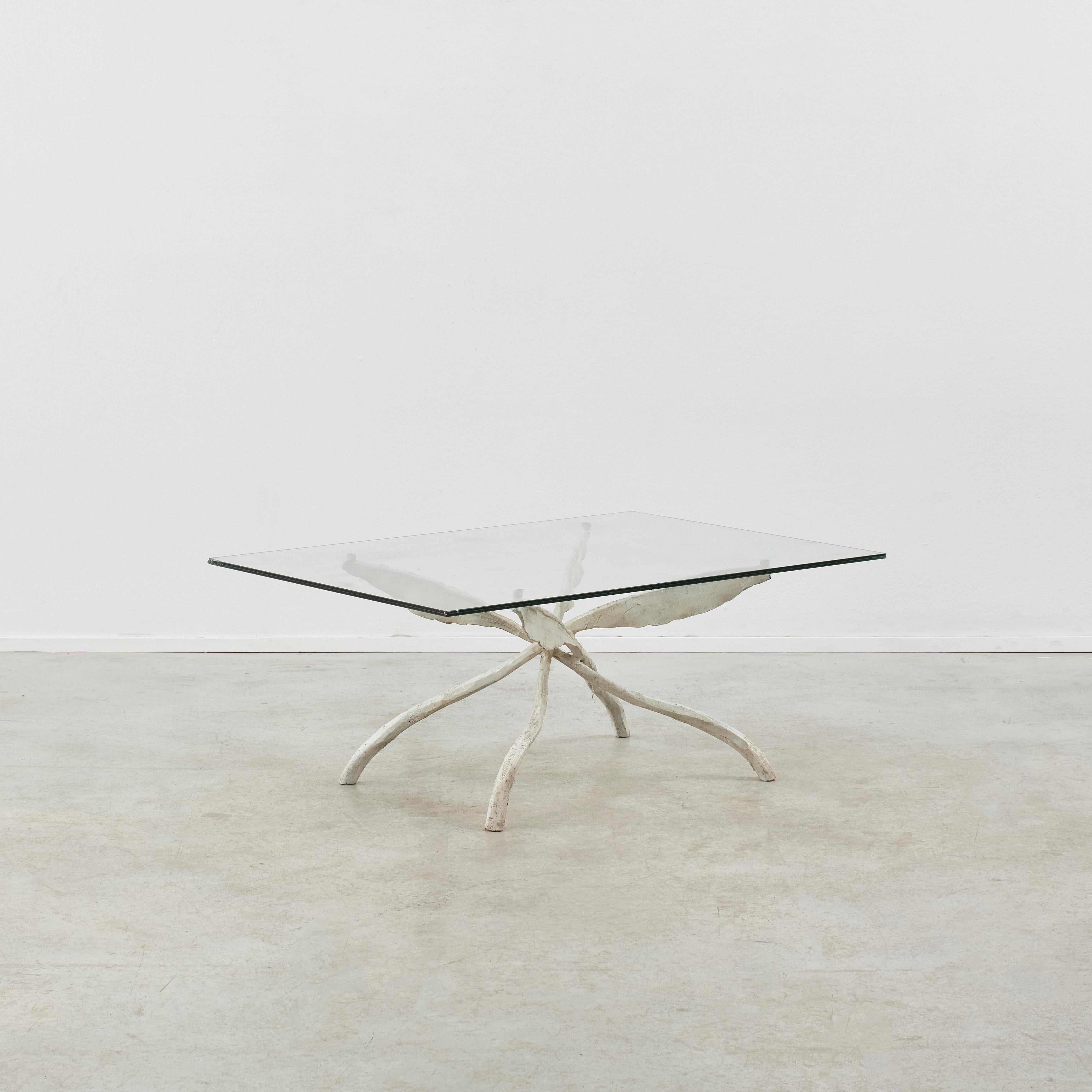Four branch-like shapes interlock at the centre of the Kilia coffee table. Textural, patinated and pared-back; forms are held in the balance. 

The table base is in good condition, featuring patination true to its age. This piece comes with a new