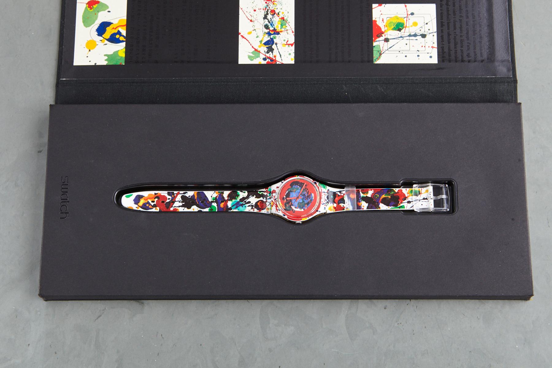 Sam Francis’s eponymous collaboration with Swatch is an action painting on the wrist. 
The bold dial is a deep crimson with a saturated blue field of colour floating over black. The hands are red as well, and the strap features black shapes,