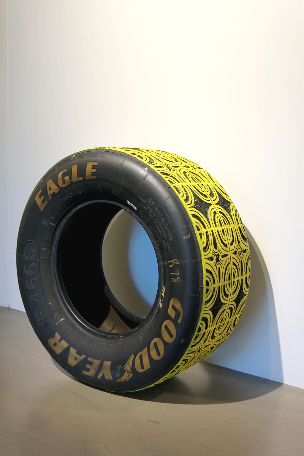 Sam Fresquez Abstract Sculpture - "Second Place is the First Loser" carved tire sculpture Nascar