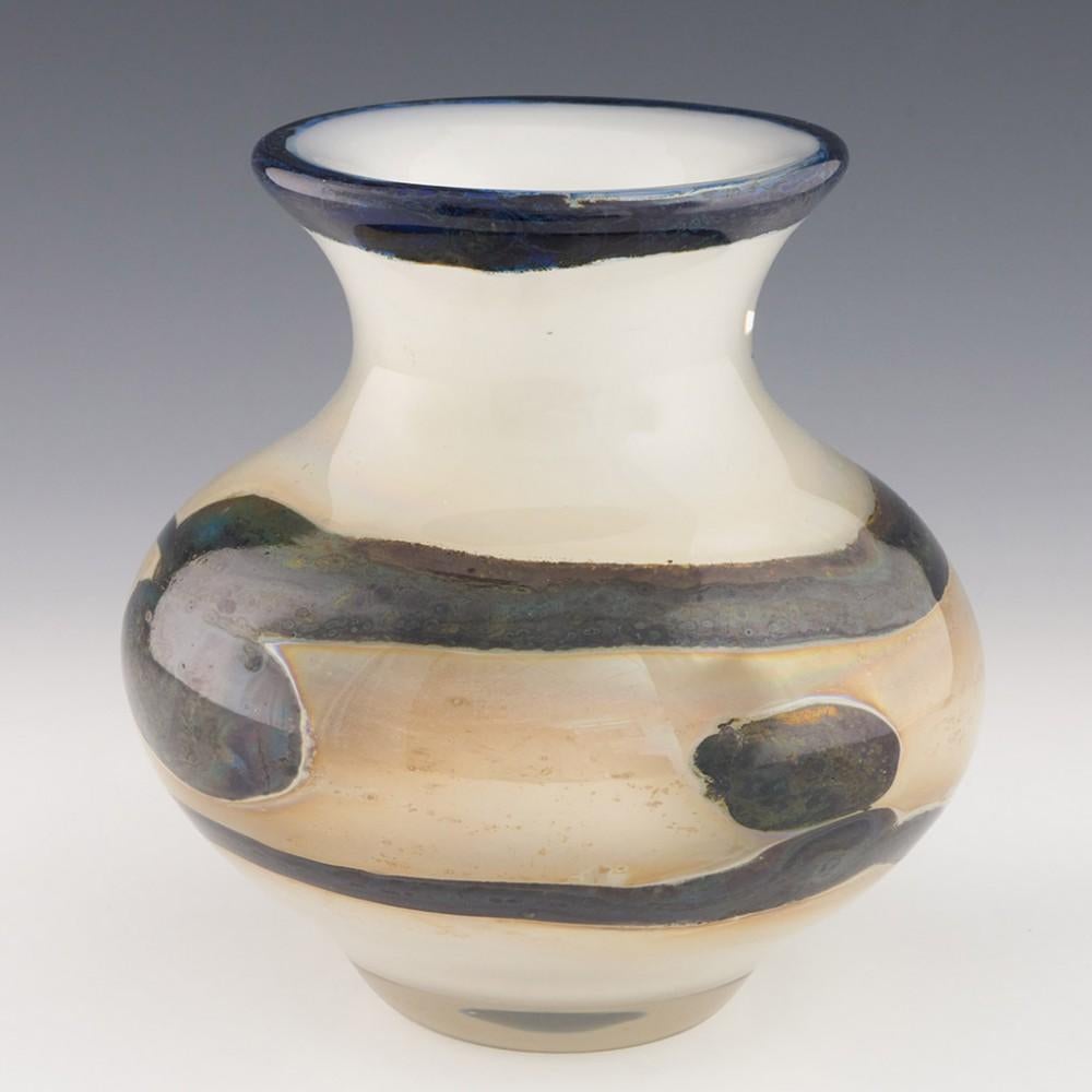 Heading : Val St Lambe 'Eldorado' series vase designed by Sam Herman
Date : c1978
Origin : Seraing, Belgium
Bowl Features : Heavily cased - off white ground with abstract blue design.
Marks : Incised Val St Lambert SH to base- for Sam Herman
Type :