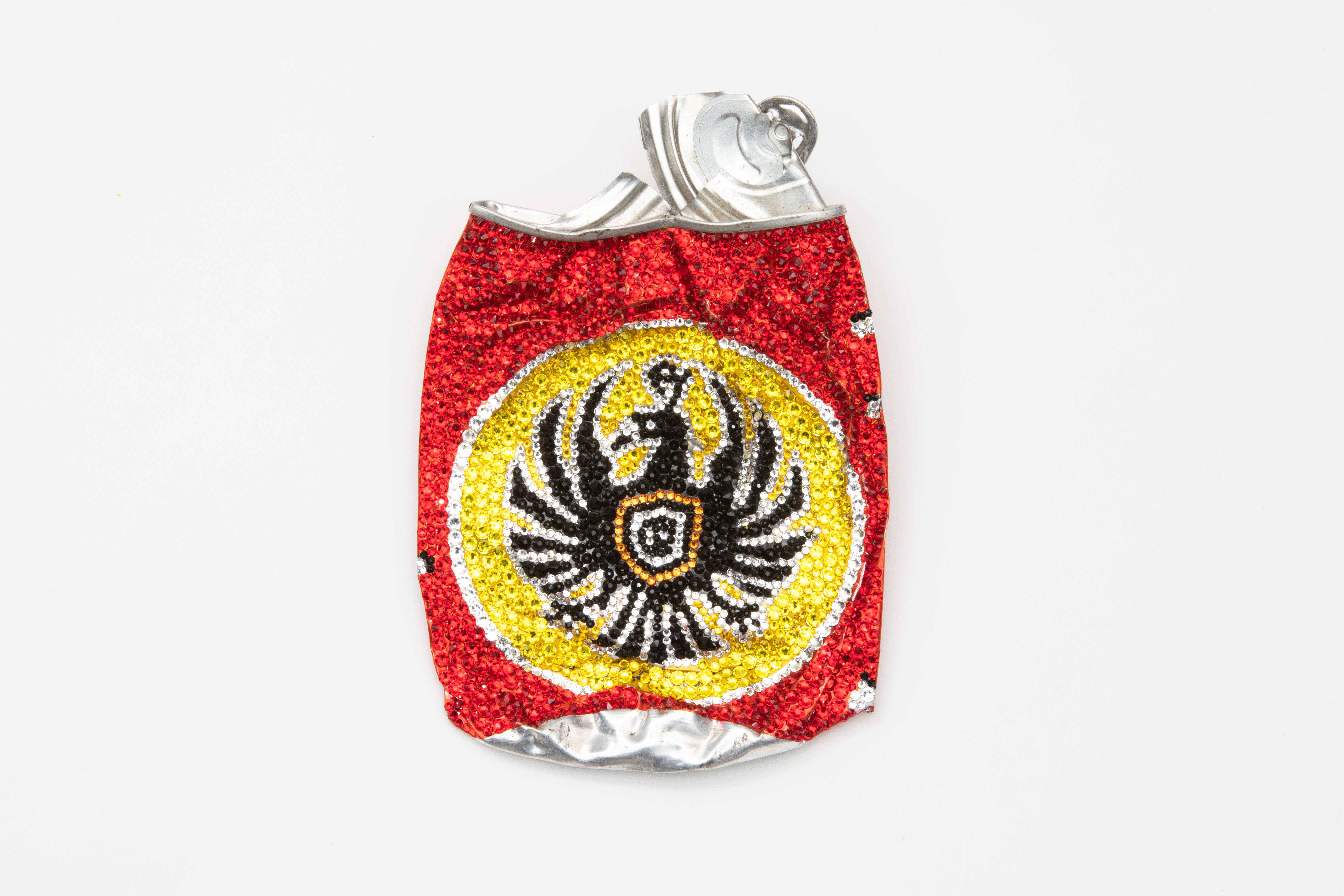 Sculpture made from Swarovski crystals and a found, car-flattened “Imperial” beer can by Los Angeles-based artist Sam Keller. The backside is signed and features a D-ring anchor for hanging. This piece was featured in Sam Keller's 2023 solo