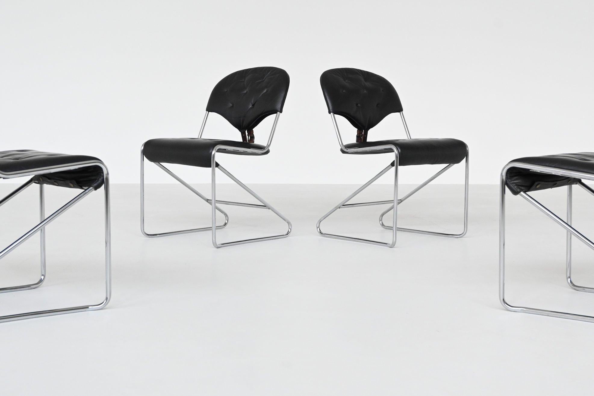 Sam Larsson set of four dining chairs in black leather Dux Sweden 1960 3