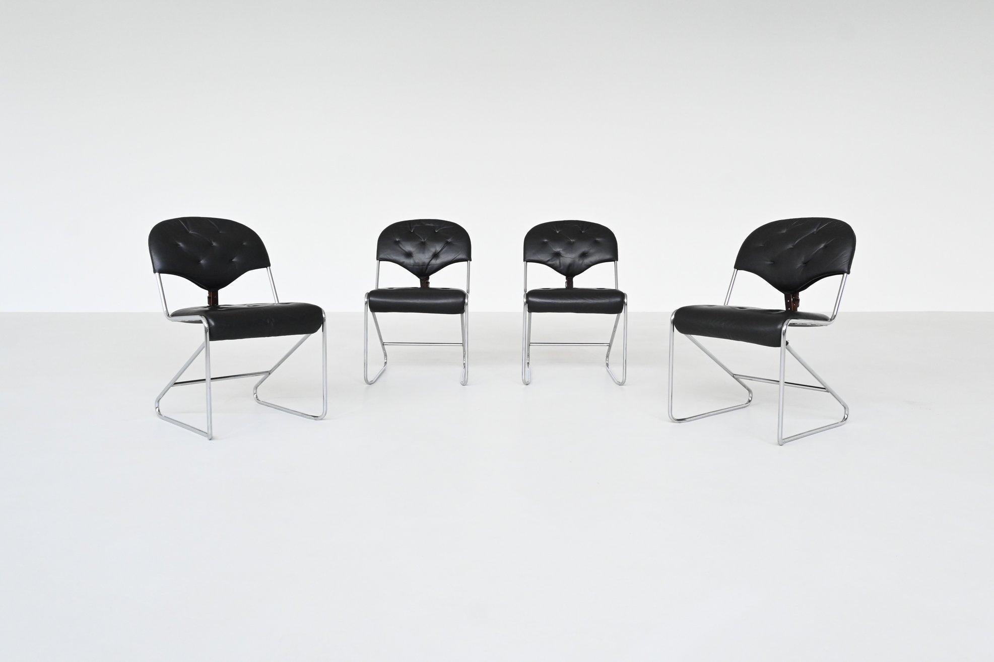 Sam Larsson set of four dining chairs in black leather Dux Sweden 1960 4