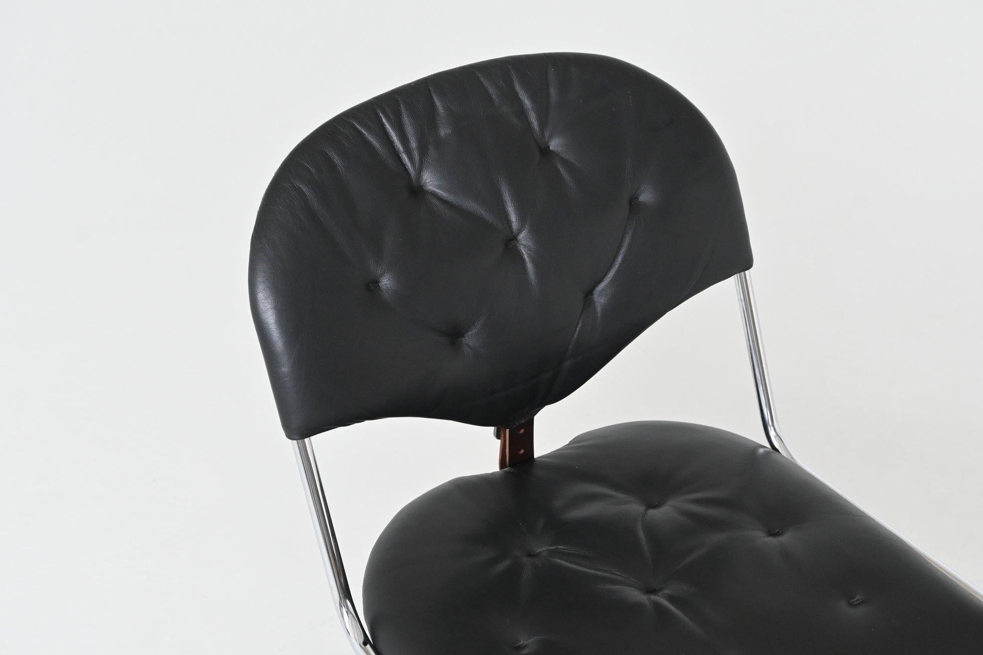 Sam Larsson set of four dining chairs in black leather Dux Sweden 1960 8