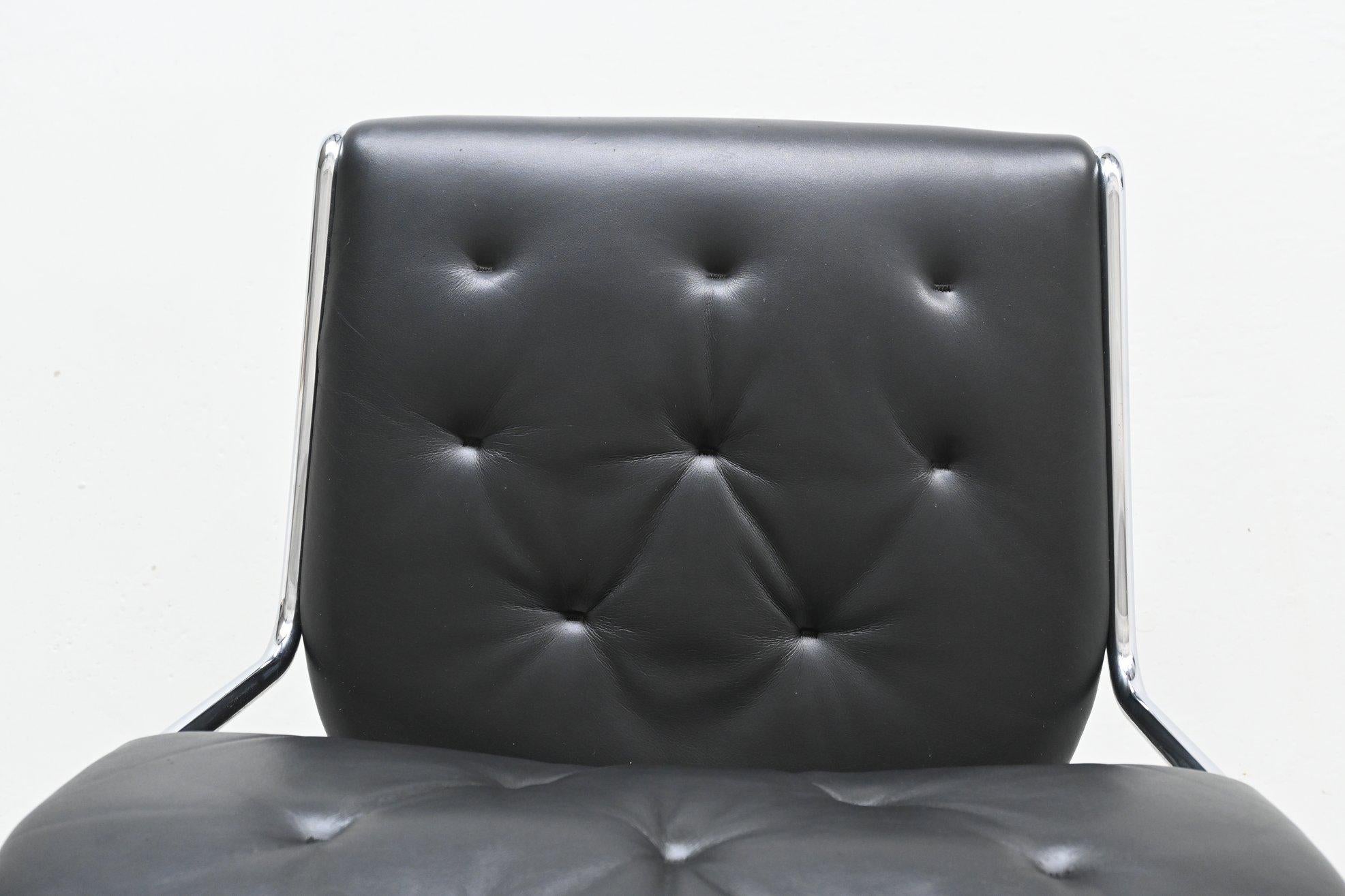 Sam Larsson set of four dining chairs in black leather Dux Sweden 1960 9