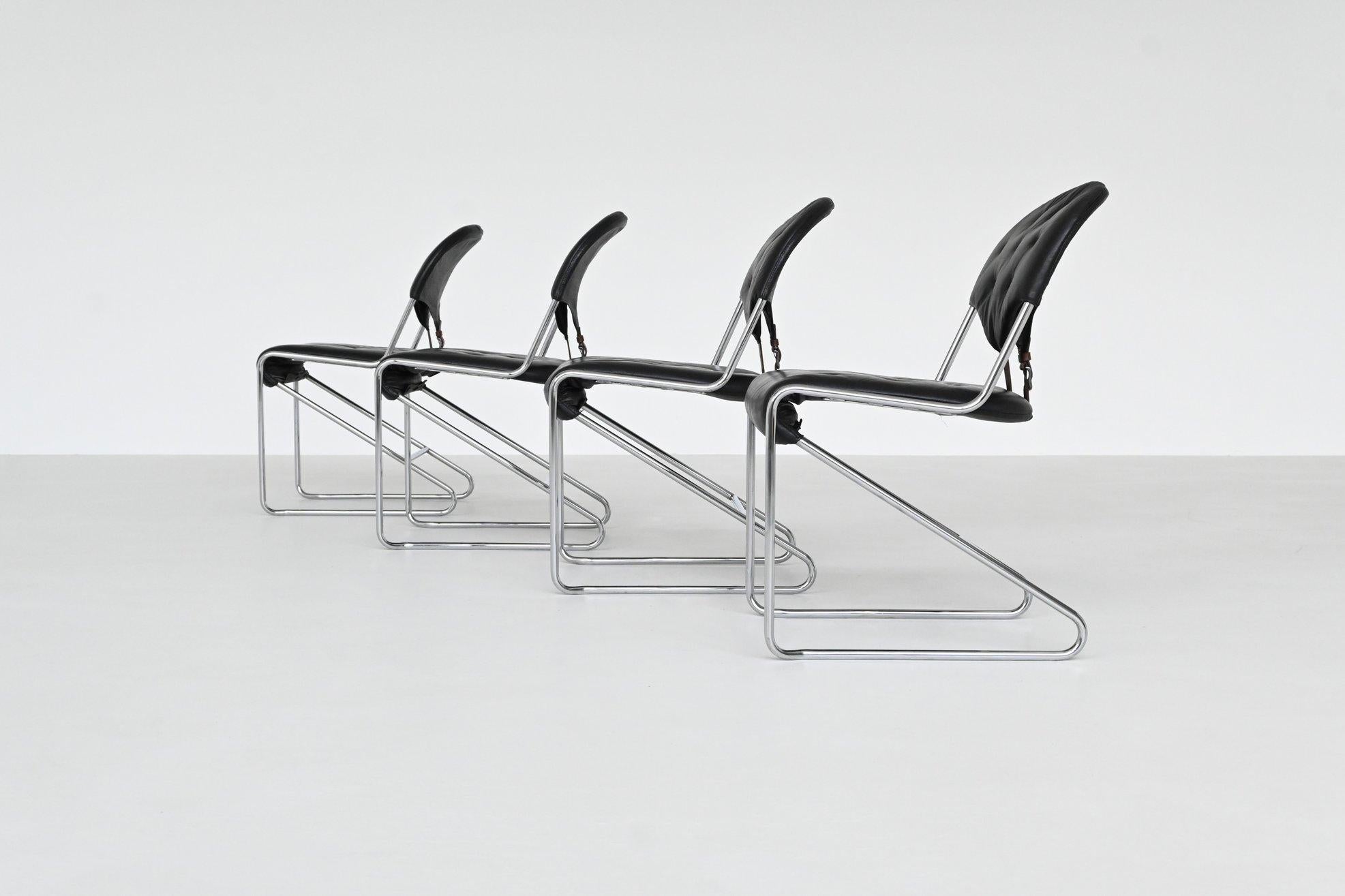 Scandinavian Modern Sam Larsson set of four dining chairs in black leather Dux Sweden 1960