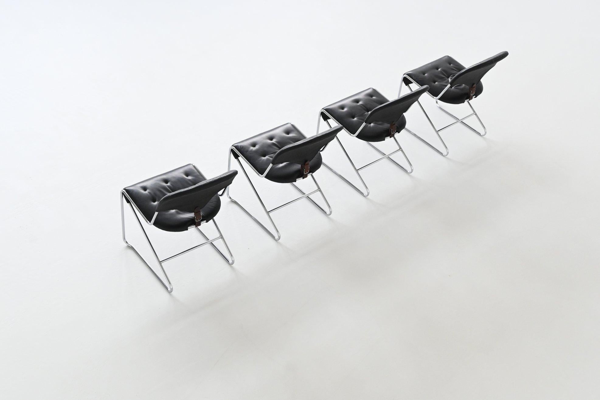 Mid-20th Century Sam Larsson set of four dining chairs in black leather Dux Sweden 1960