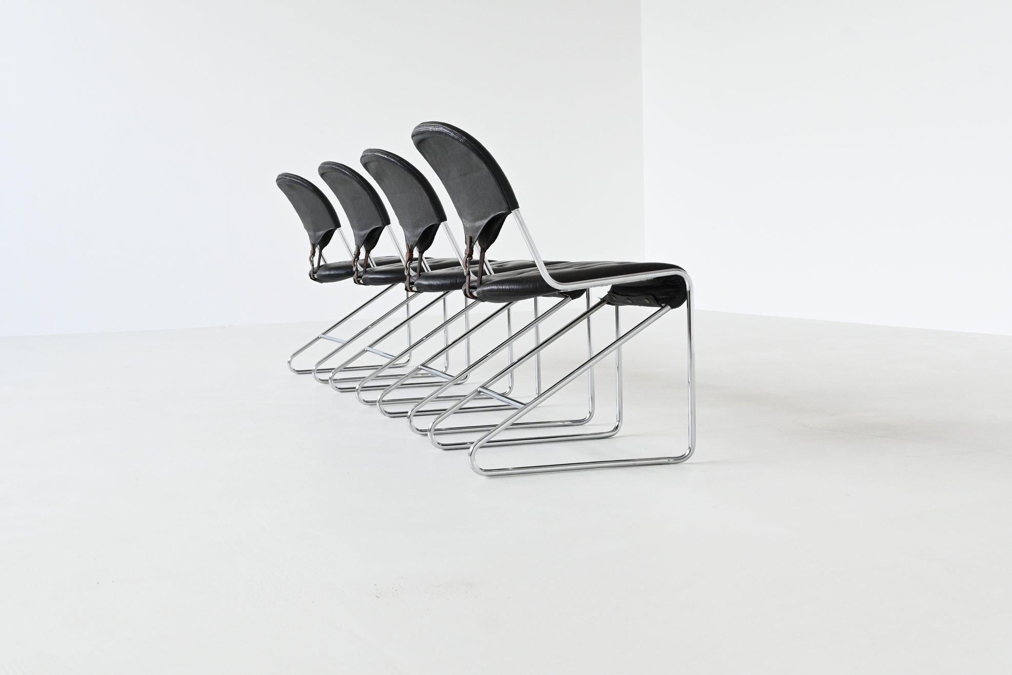 Sam Larsson set of four dining chairs in black leather Dux Sweden 1960 1
