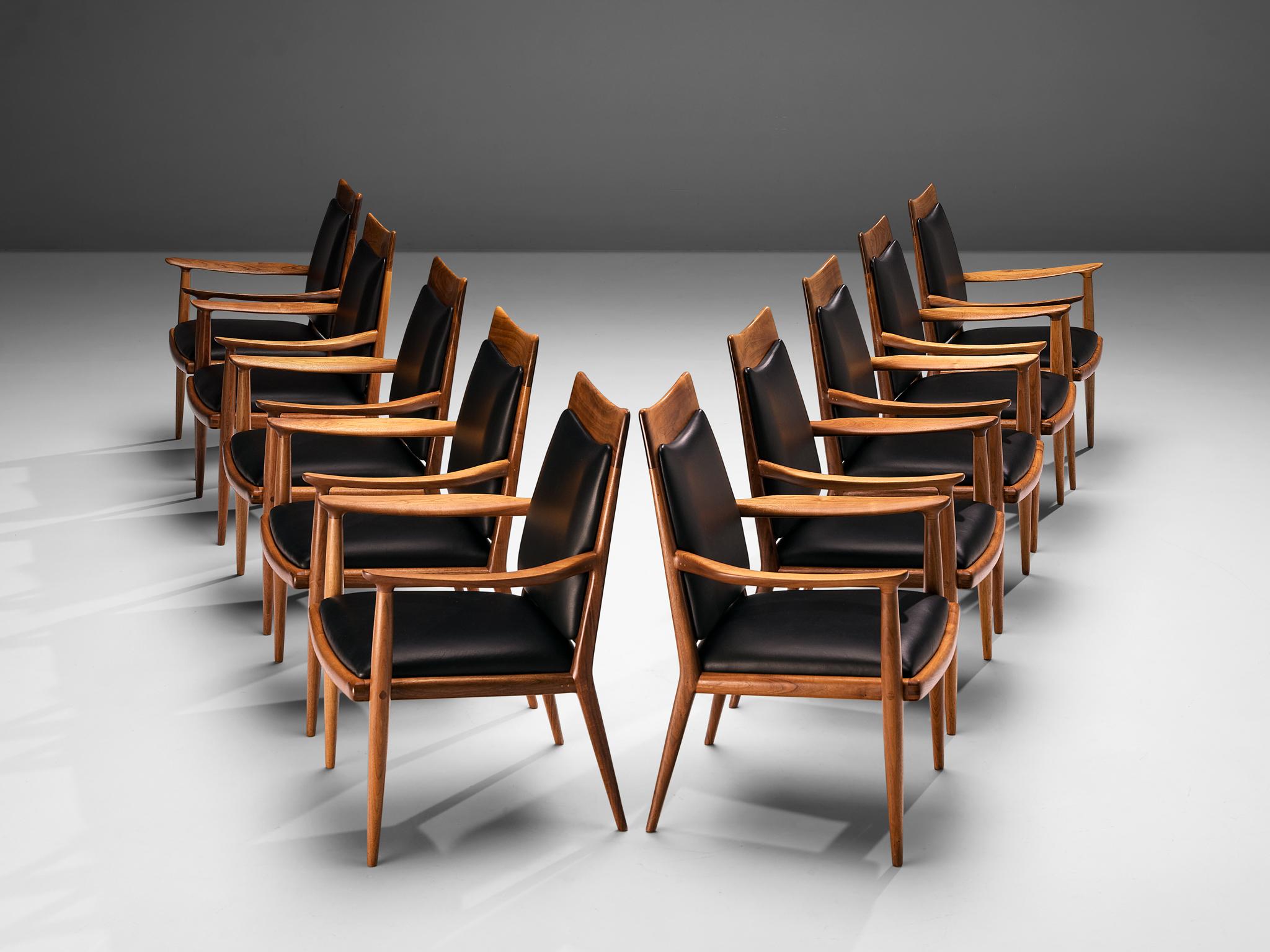 Sam Maloof, set of dining chairs, walnut, black leather, United States, 1960s

Exquisite set of ten armchairs by renowned American designer Sam Maloof. Famous for his handcrafted furniture with strong lines, expressive grain and admirable joints