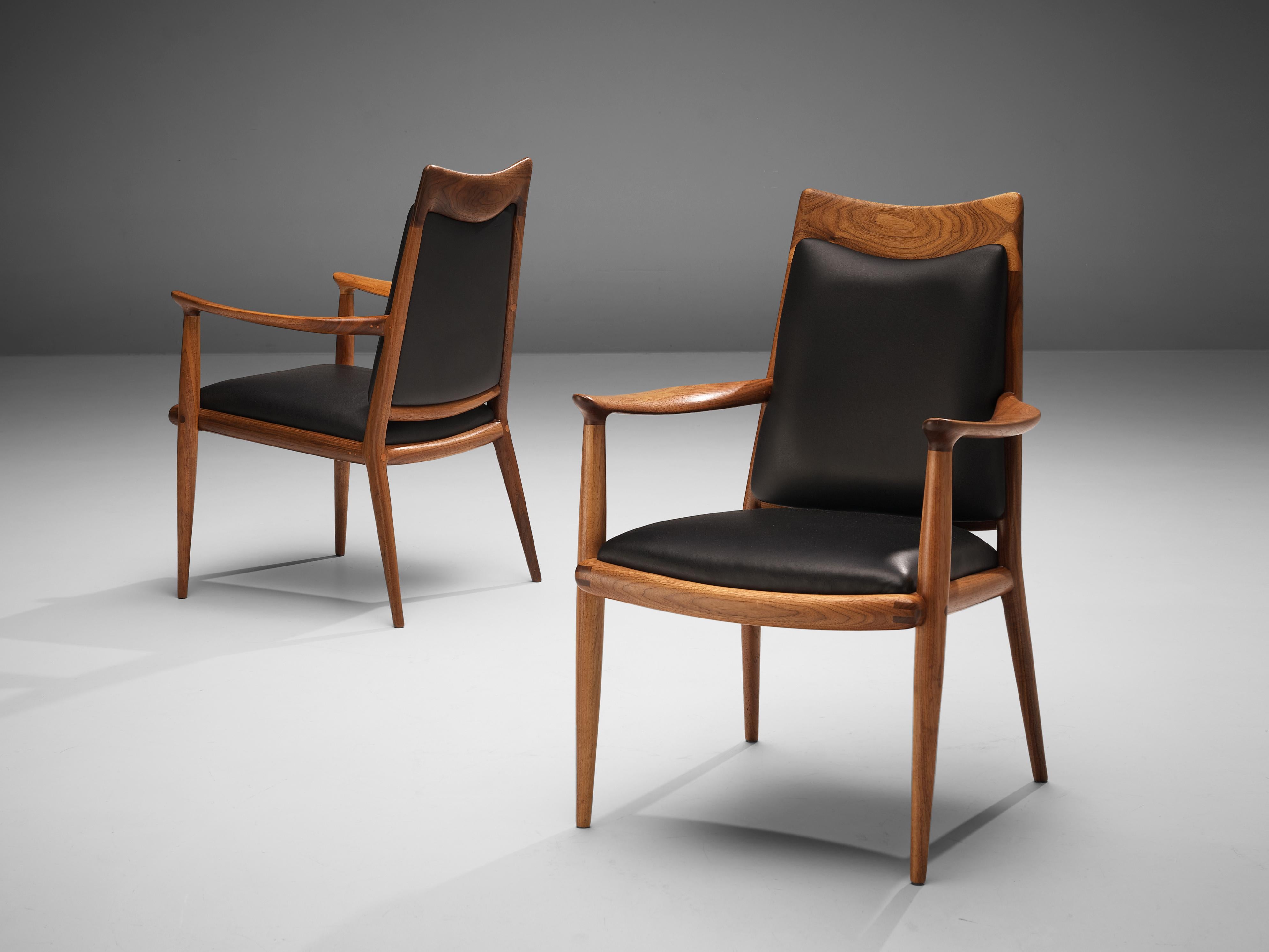 Sam Maloof, dining chairs, walnut, black leather, United States, 1960s

Exquisite armchairs by renowned American designer Sam Maloof. Famous for his handcrafted furniture with strong lines, expressive grain and admirable joints this rare set is a