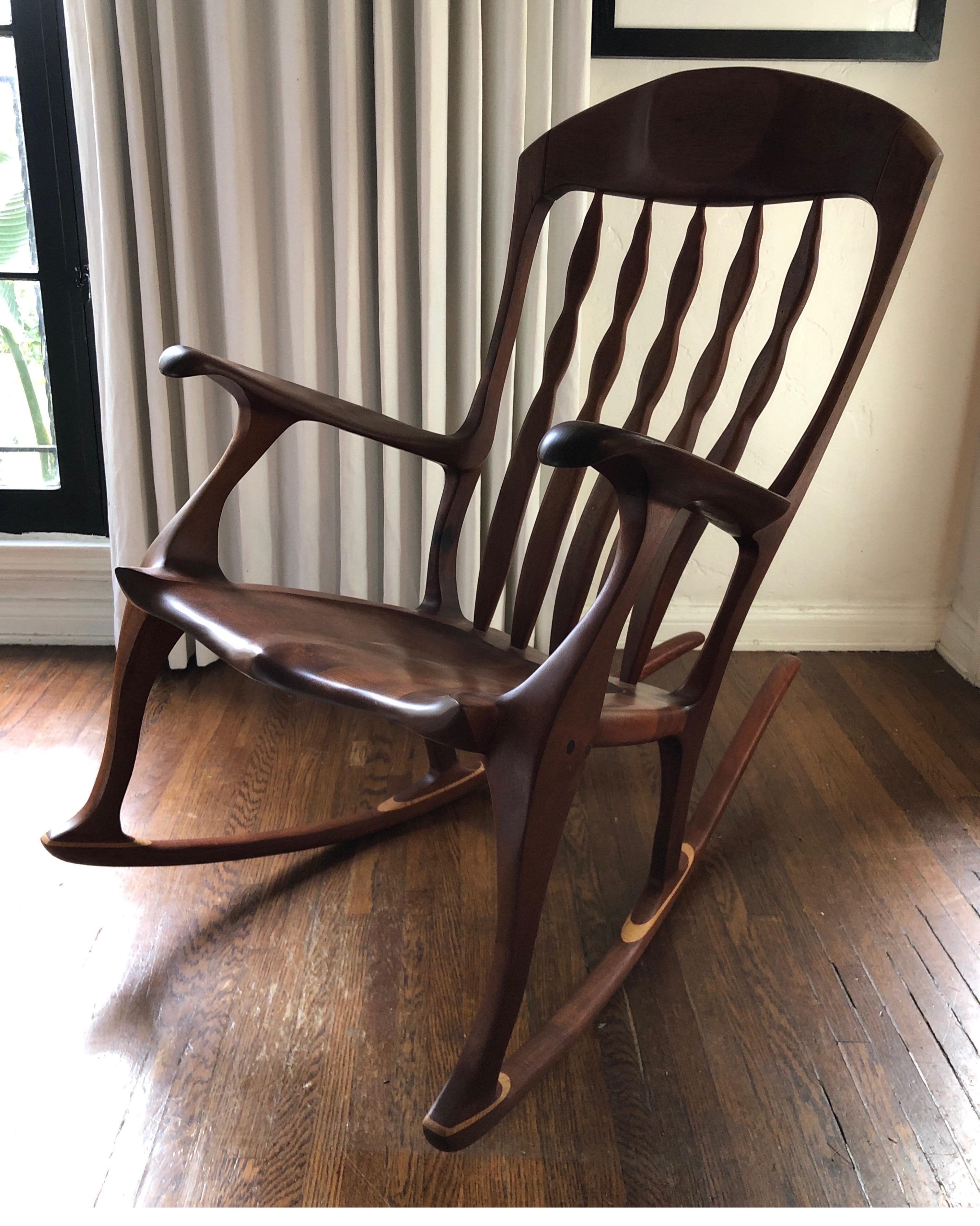 Hand carved rare tiger maple Sam Maloof style rocking chair.
Mid-Century Modern with incredible unique lines.

Large sized and very comfortable. 

Signed Bill Kappell.