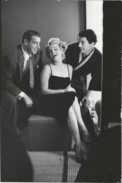 Marilyn Monroe backstage with her husband Joe DiMaggio and actor David Wayne