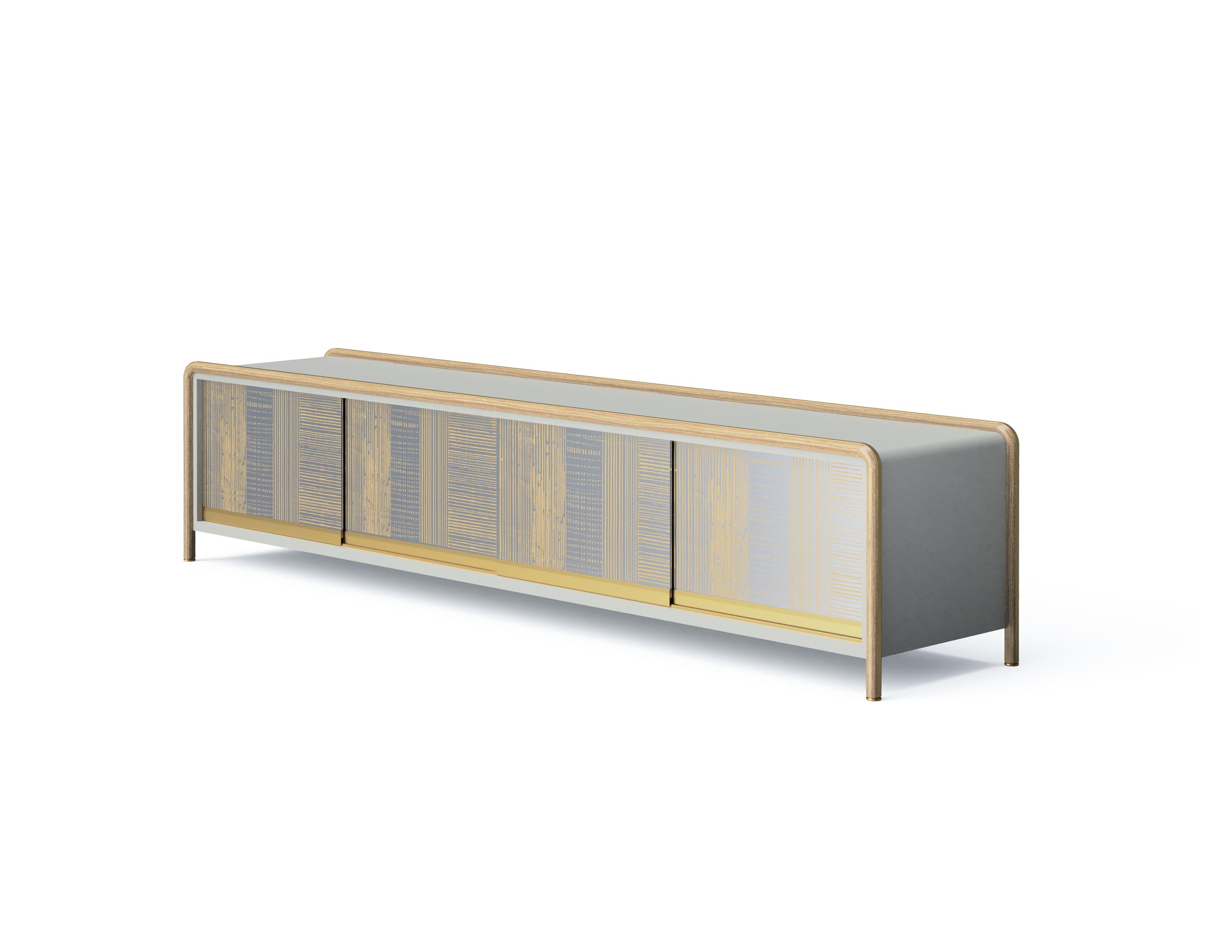 Manufactured using the woodturning technique, the solid wood , gently wraps around the top of the unit and come down to form the unit’s feet. The lacquered body adds serenity to ‘Sam’, which has versions with drawers and sliding doors.
‘Sam TV Unit’