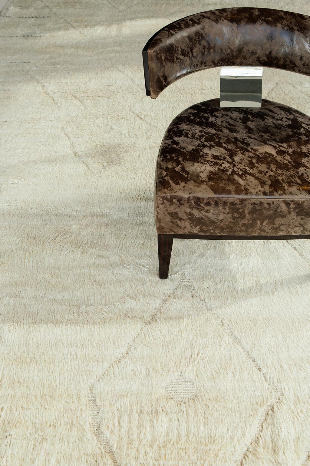 Handwoven of luxurious wool, with timeless design elements and neutral color palette. This Mehraban design is a contemporary interpretation of an Azilal, a part of our Atlas Collection. Azilal tribal rugs from Morocco are noted for their hand-spun
