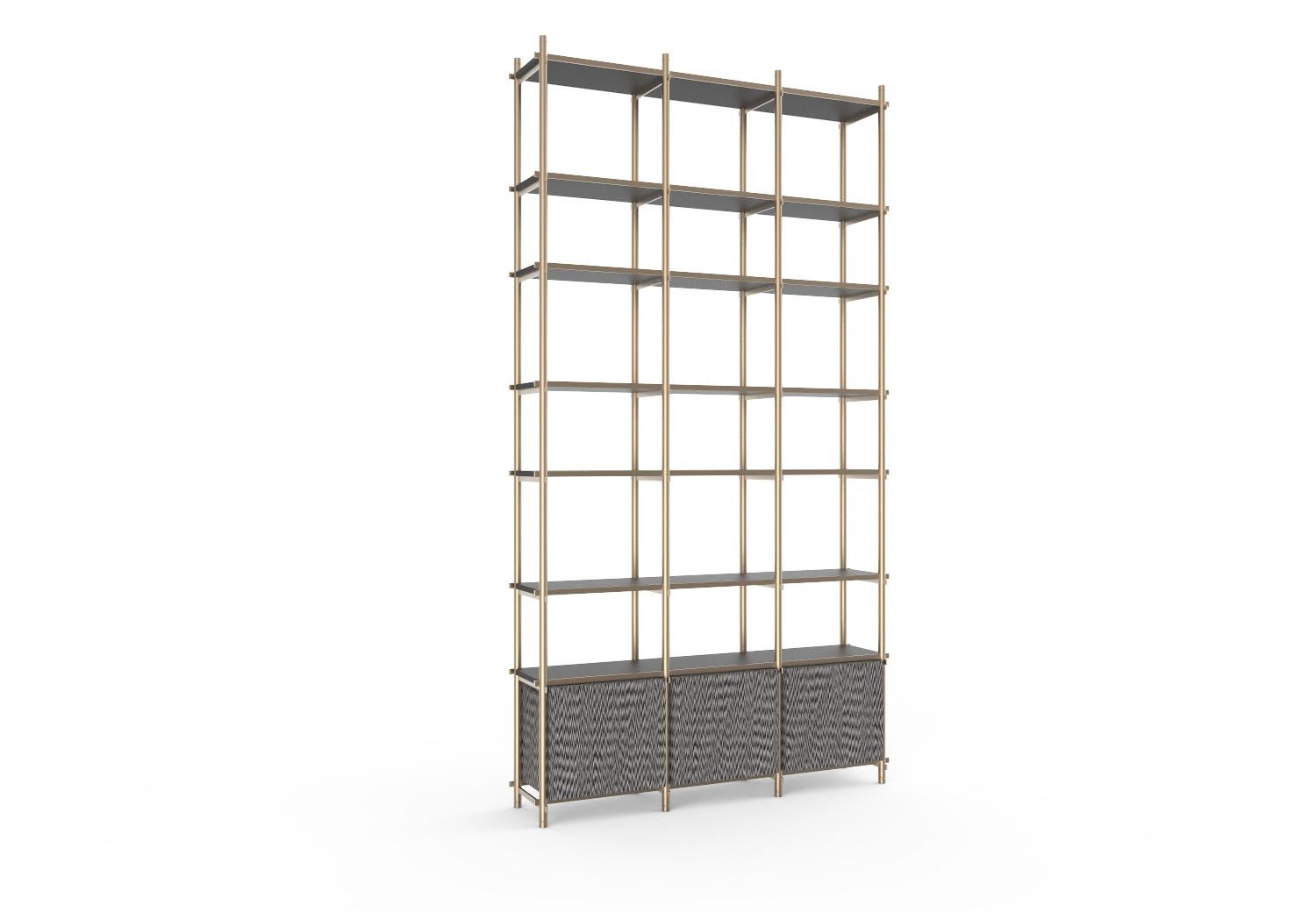 Modular bookshelf with closed modular compartments in different options of wood. Tubular laser-cut interlocking structure in metal, light brass satin finish.