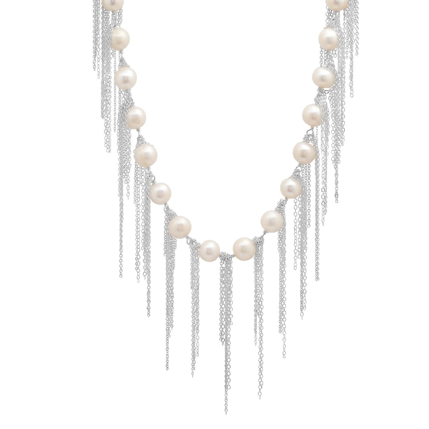 Signature white freshwater pearl fringe necklace by Los Angeles based fine jewelry designer, Samira 13. Sterling silver chain. Can be worn many ways.

Exploring the unique and varied aspects of pearls is the cornerstone of Samira 13