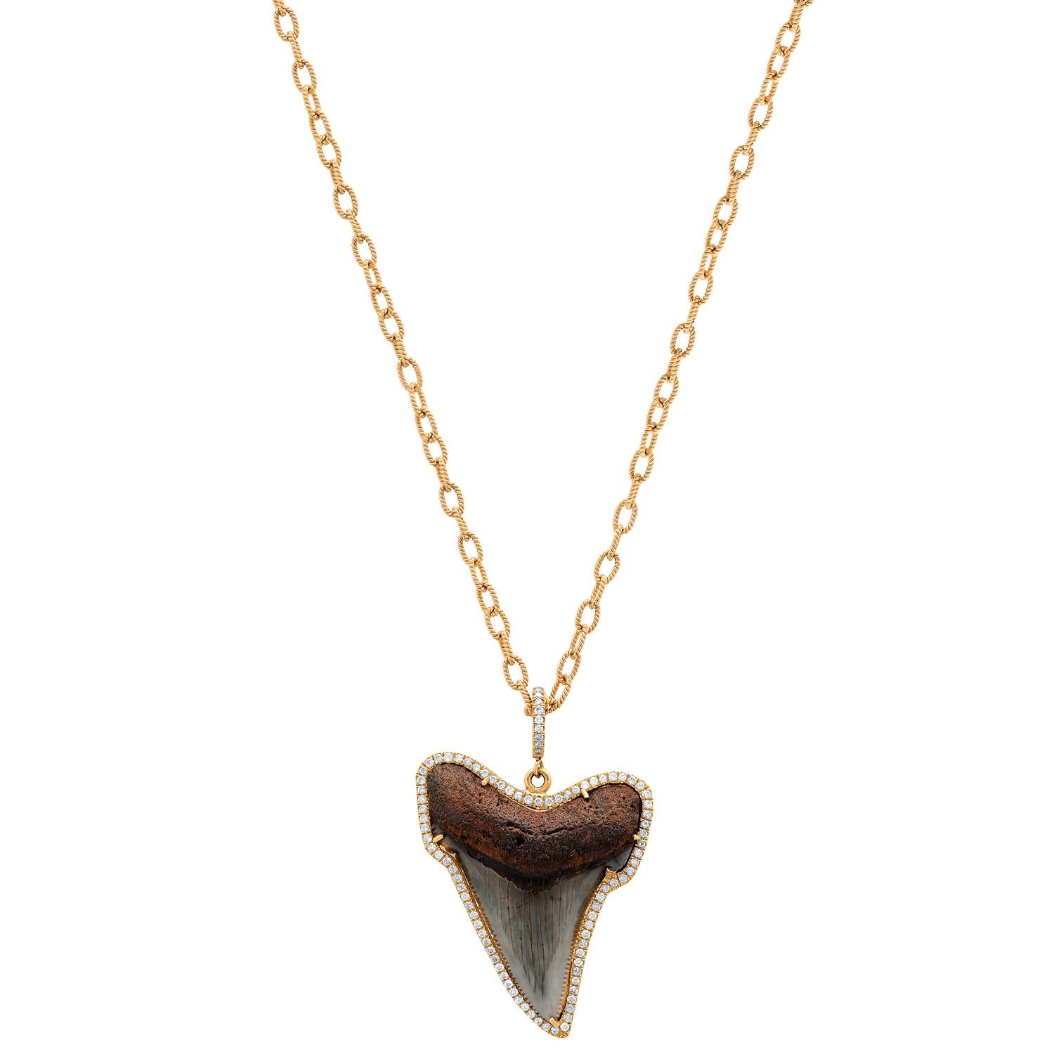 Modern & edgy pave diamond shark tooth pendant necklace from Los Angeles based fine jewelry designer, Samira 13. Each tooth is unique.
Handmade 30