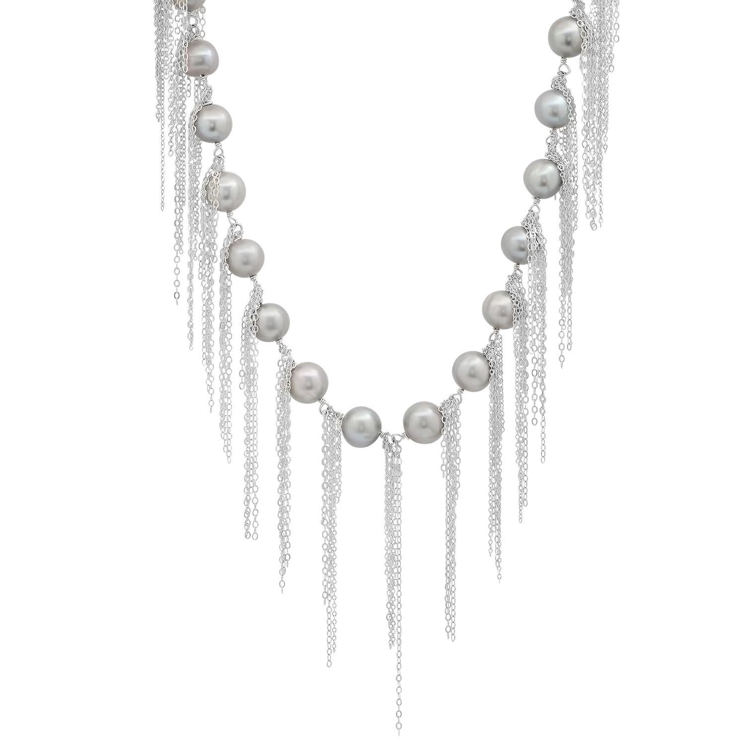 Signature silver tone freshwater pearl fringe necklace by Los Angeles based fine jewelry designer, Samira 13. Sterling sliver chain. Can be worn many ways. 62