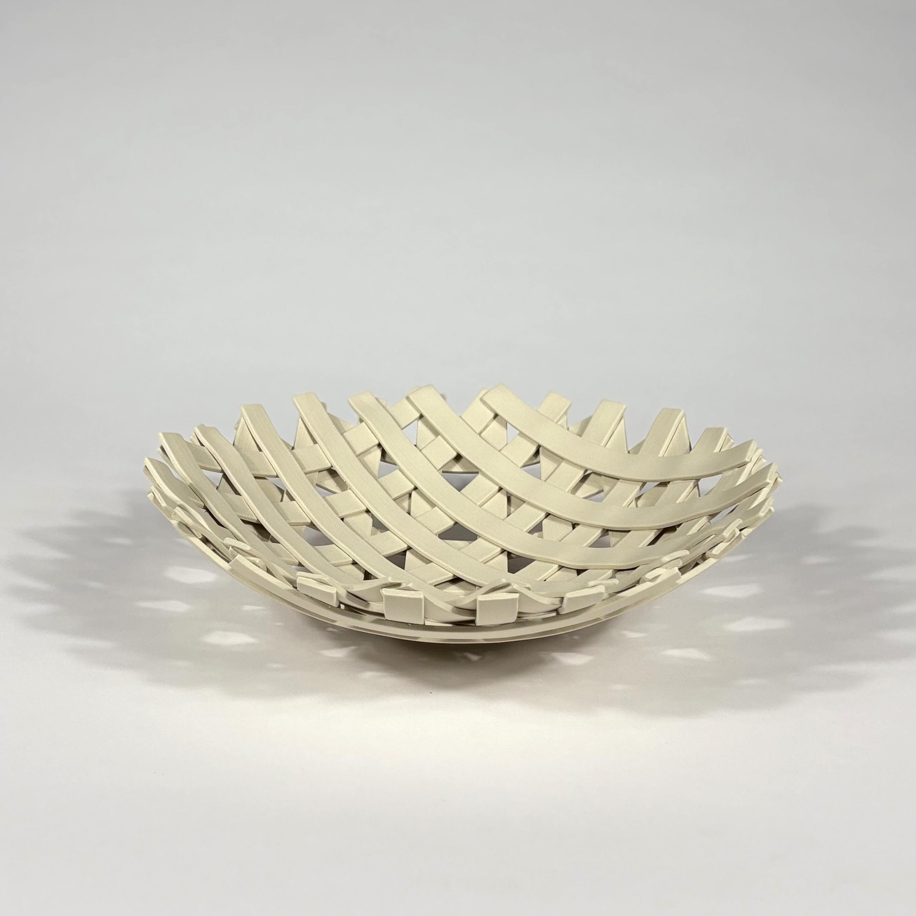 Samos / E Centrepiece by Enzo Mari
1973 / 2004 
Driade

Originally produced by Danese in 1973 with the Driade edition starting production in 2001 for the Driade Kosmo Follies collection.

Hand-crafted natural color grey stoneware.

Comes with