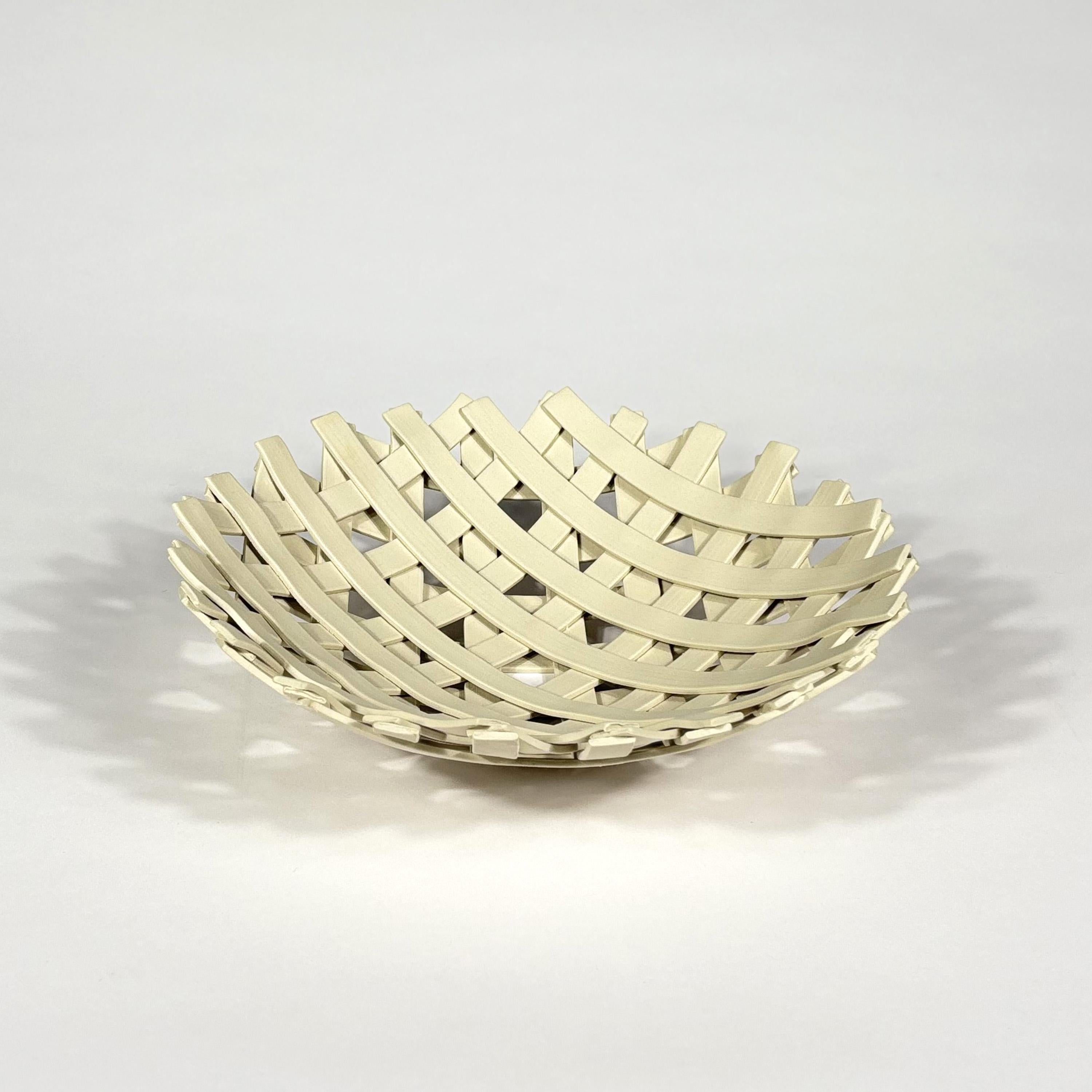 Samos / E Centrepiece by Enzo Mari
1973 / 2004 
Driade

Originally produced by Danese in 1973 with the Driade edition starting production in 2001 for the Driade Kosmo Follies collection.

Hand-crafted natural color grey stoneware.

Comes with