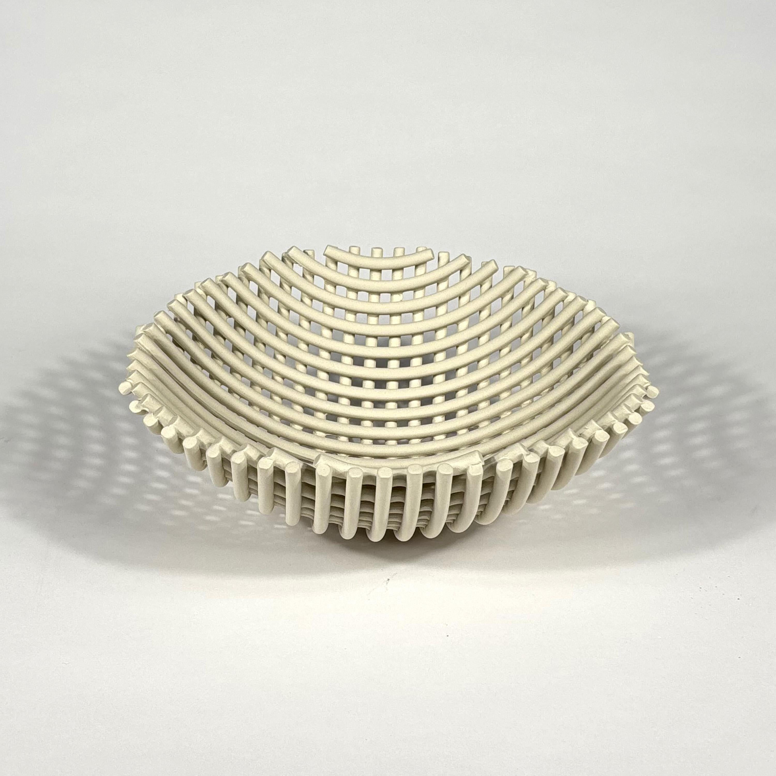 Samos / G Centrepiece by Enzo Mari
1973 / 2004 
Driade

Originally produced by Danese in 1973 with the Driade edition starting production in 2001 for the Driade Kosmo Follies collection.

Hand-crafted natural color grey stoneware.

Comes with