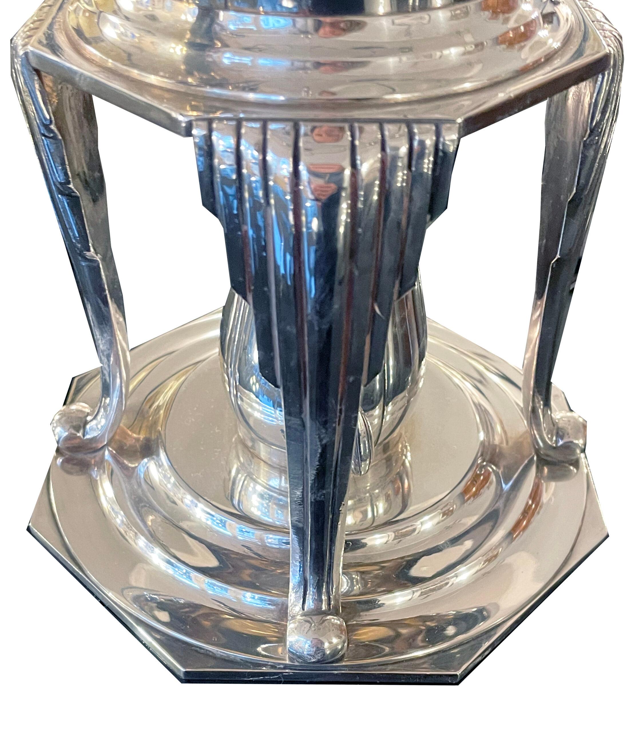 Art Deco samovar

Silver-plated masterpiece from the renowned manufacturer “Bouillet et Bourdelle”. The samovar, a work of Art Deco that is typical of the period, is characterized by clear lines and an elegant design. Made from silver-plated metal,