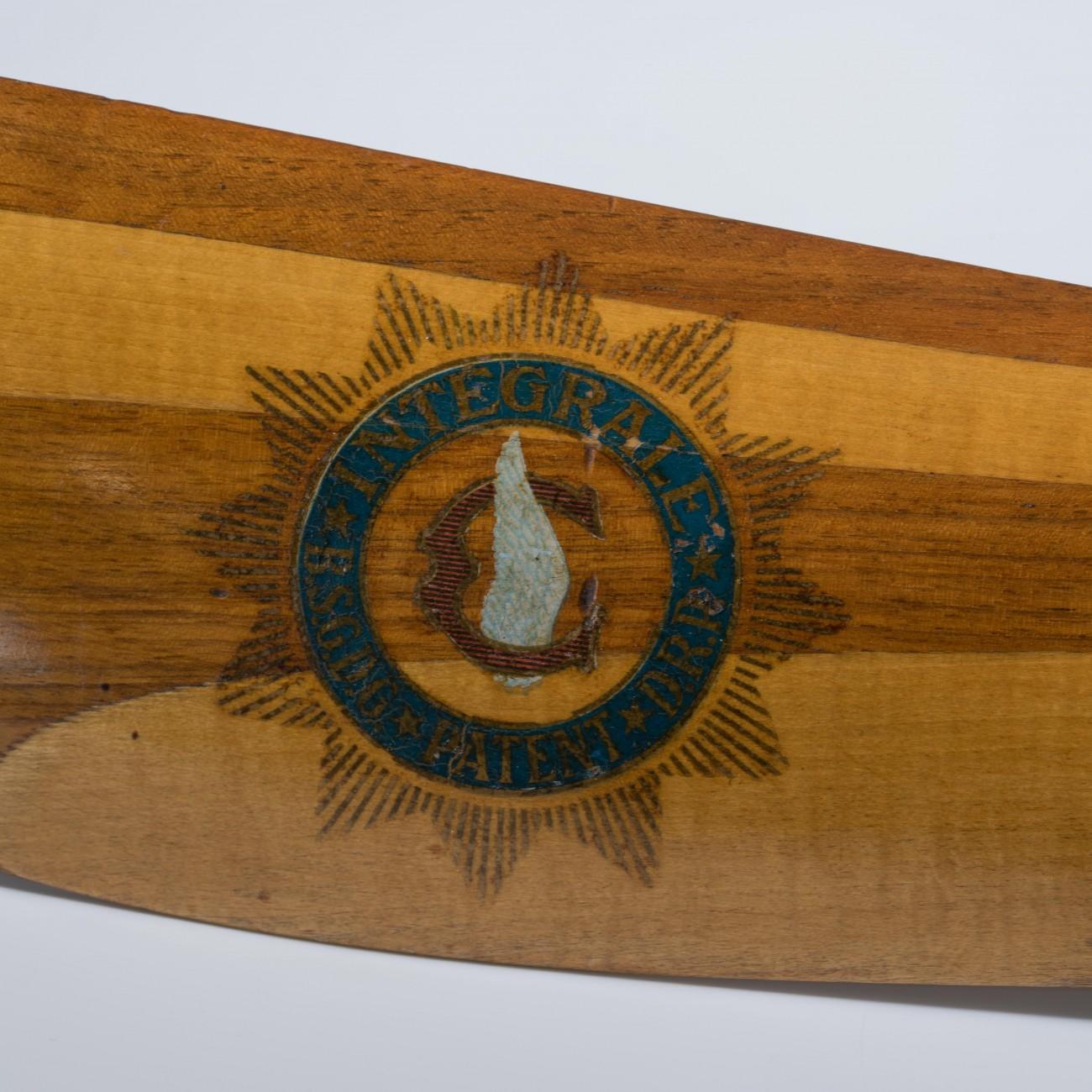 This wonderful scaled down laminated carved wooden ‘sample’ propeller was made in a similar way to full size propellers of this era; circa 1914. It has the international decall from Integrale when they had workshops in Germany and Britain as well as