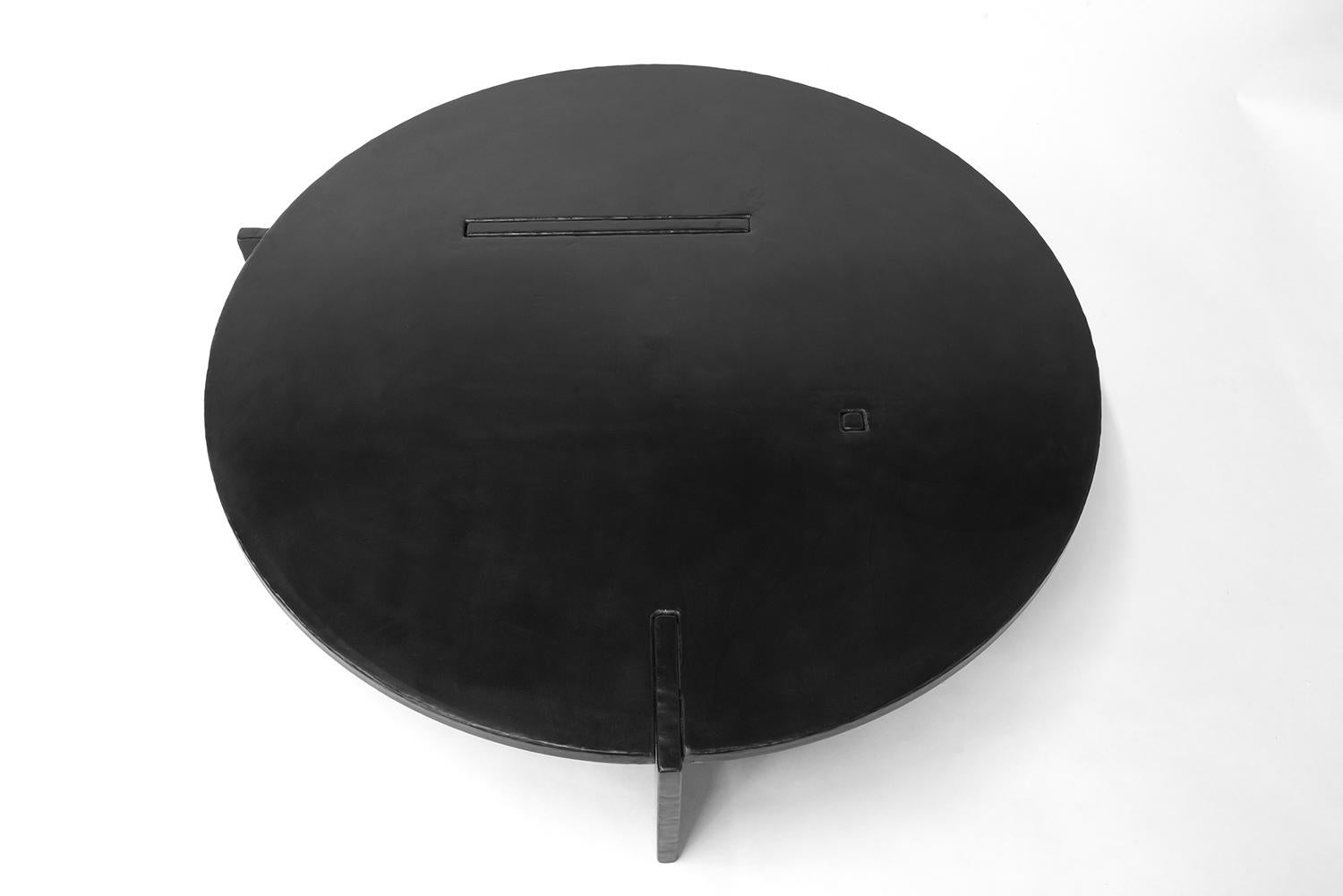 TABLE NO. 20
J.M. Szymanski


A dynamic and exciting table sculpture. Carved steel panels connect together, resulting in a unique piece of functional sculpture. The table is hand finished in a rich and warm black patina. A modern classic for