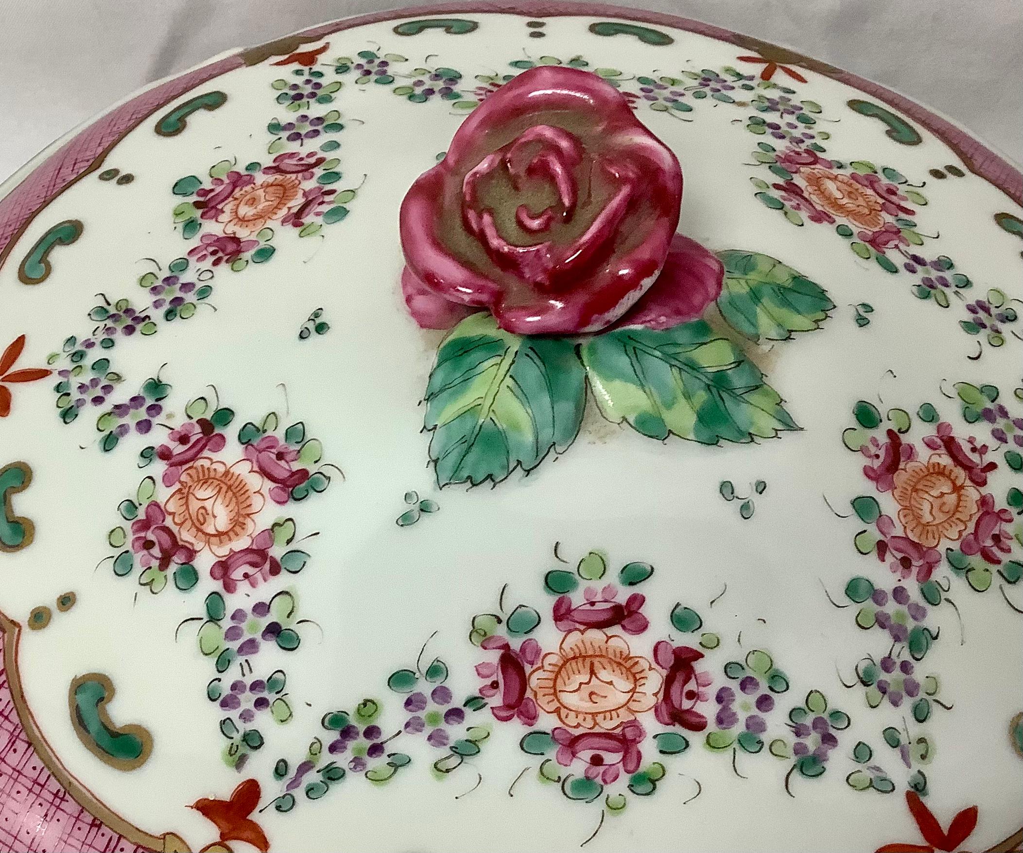 Edme Samson et Cie company. Porcelain covered tureen and under plate. Hand painted with floral and geometric design and gilt highlights. Mostly pink, blues, green and gold on a cream background. A fine example with excellent details.