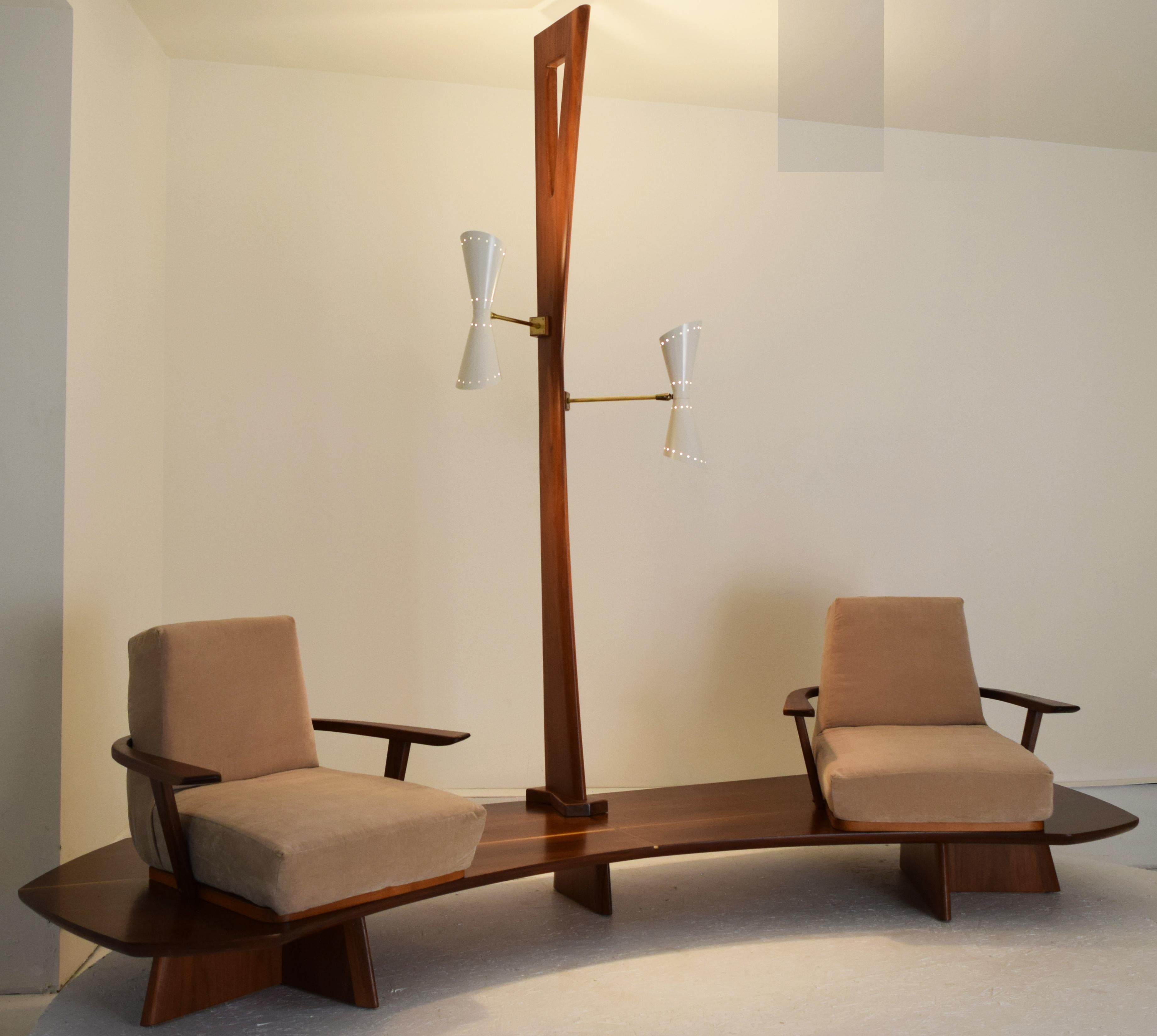 Samson Berman studio, NY, USA, circa 1955. Integrated illuminated tandem chair platform, walnut, brass, lighting. 
121.5 wide x 41.5 deep and changeable height of 101 inches tall. Lamp can be abbreviated prior to shipment for lower ceiling