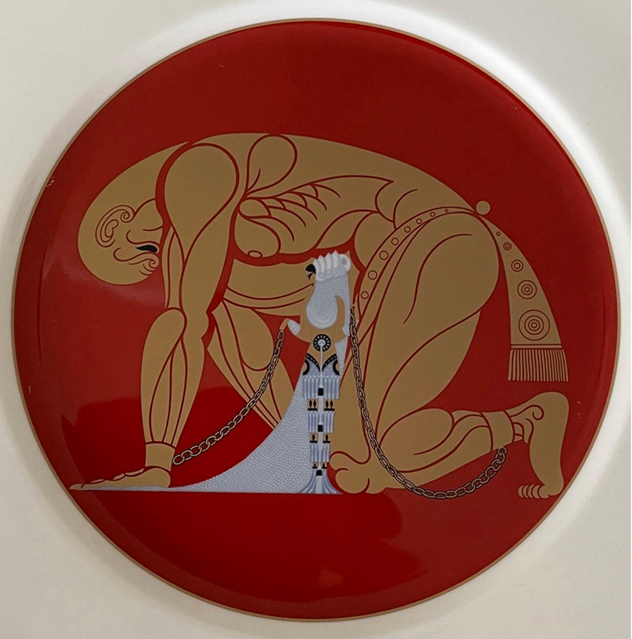 Samson and Delilah Plate is an original decorative plate realized by Erté (after) in 1987. 

The plate in Bone China depicting Samson bound in chains and Delilah in a blue gown. 

Marked with a stylized Erte sign on the back side. Marked on the back