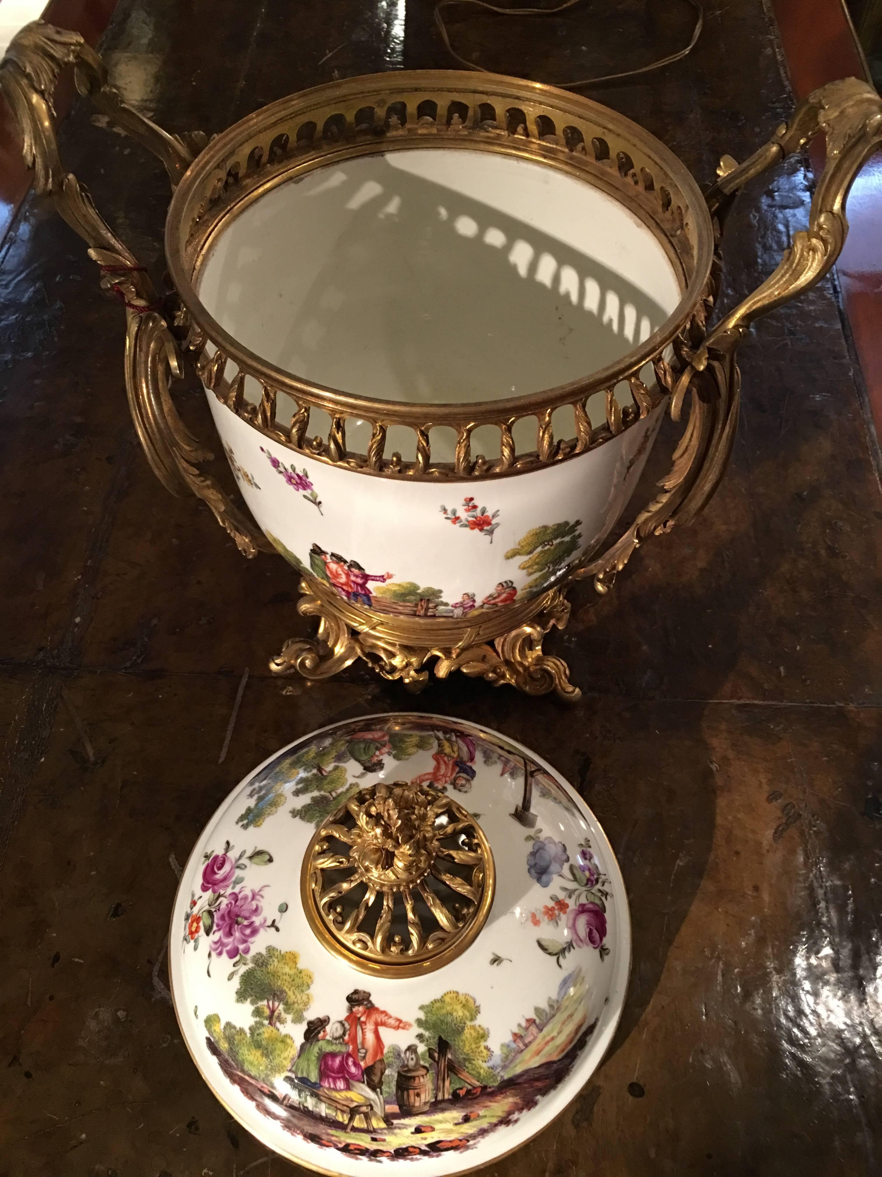 Samson Porcelaine center
mounted in Louis XV style bronze
Late 19th century
Decorated with country scenes.


