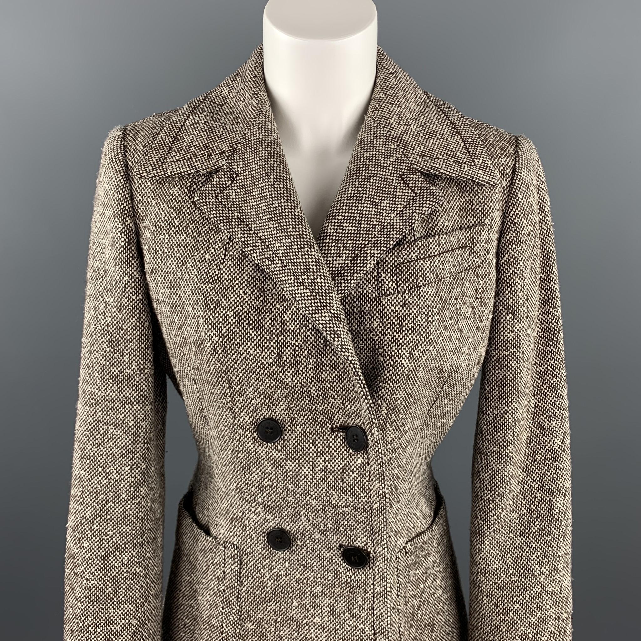 SAMSONITE jacket comes in brown / white tweed wool blend with a full liner featuring a peak lapel, patch pockets, and a double breasted closure. Made in Italy. 

Excellent Pre-Owned Condition.
Marked: 8

Measurements:

Shoulder: 16 in. 
Bust: 38 in.