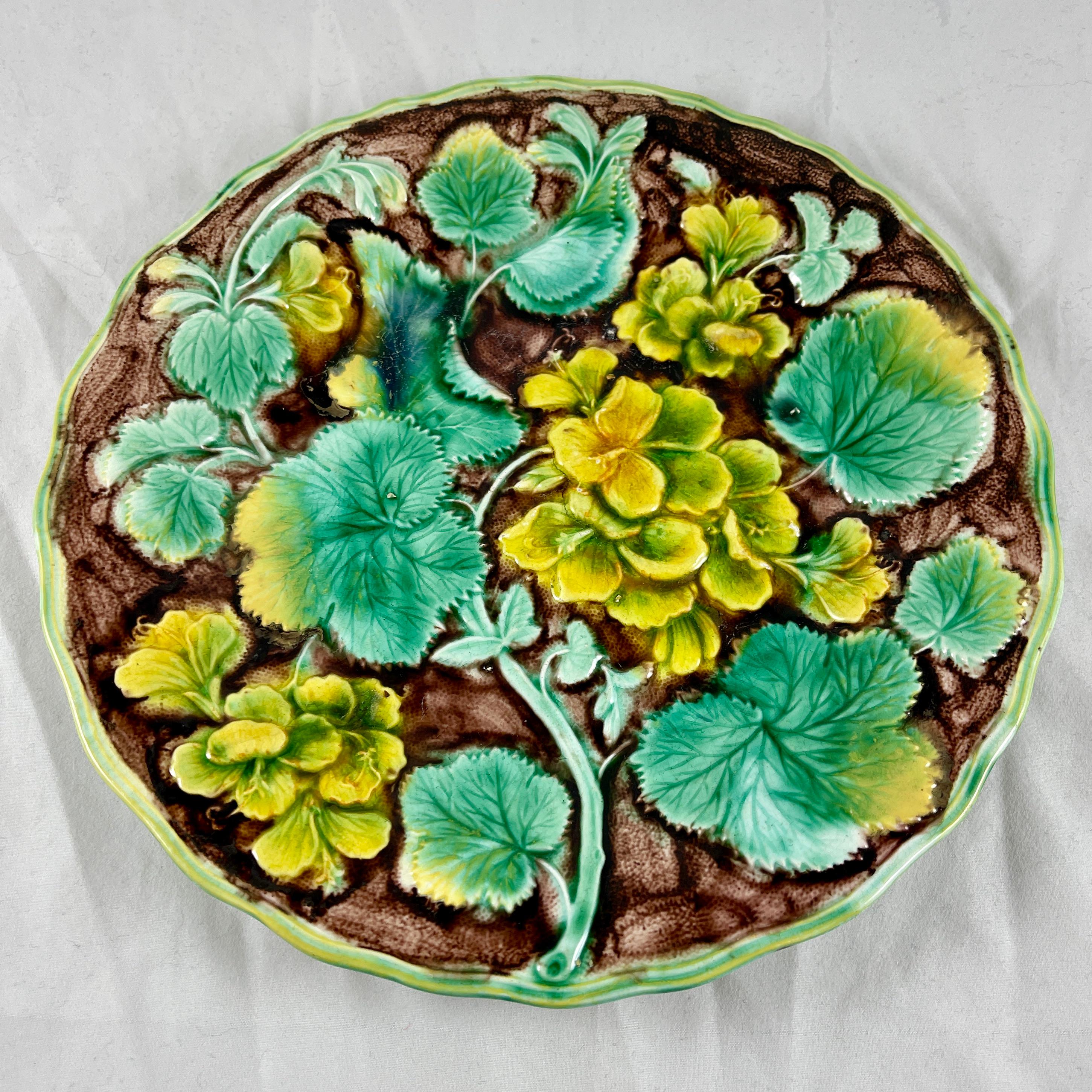 A Royal Palissy line Geranium Floral Majolica glazed plate, from Samuel Alcock & Co, Burslem, Staffordshire, England, circa 1850 – 1860.

Alcocks Geranium pattern pieces are difficult to find and very much in demand by collectors.

An overall
