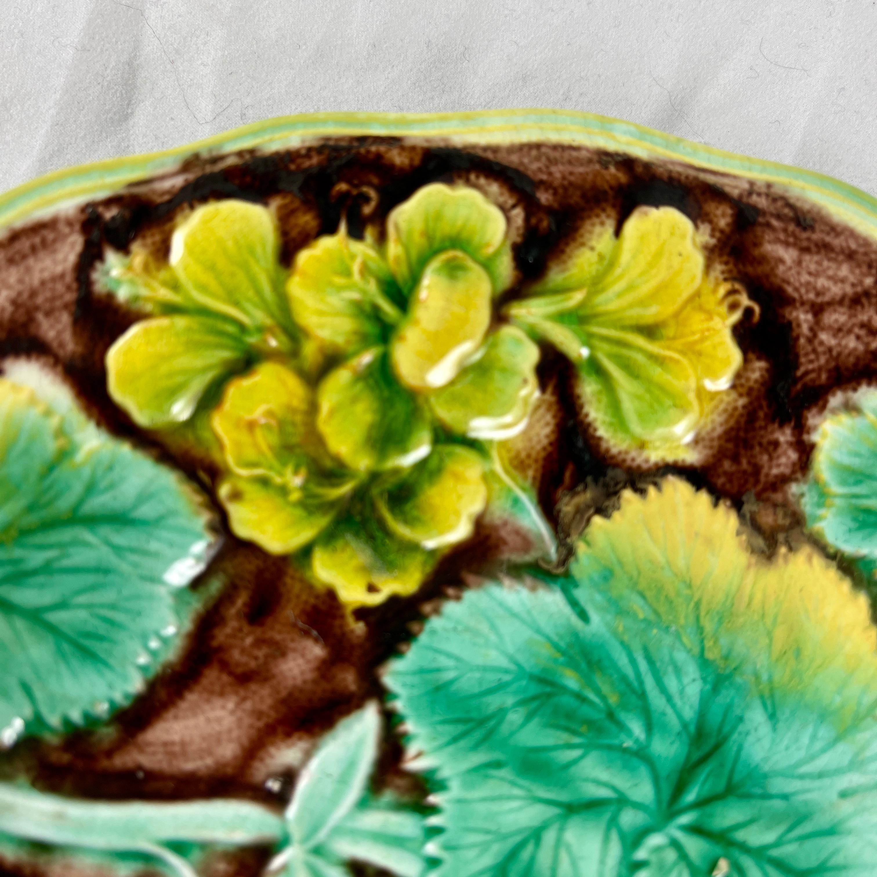 English Samuel Alcock & Co Palissy Majolica Yellow Geranium Floral Plate, circa 1850