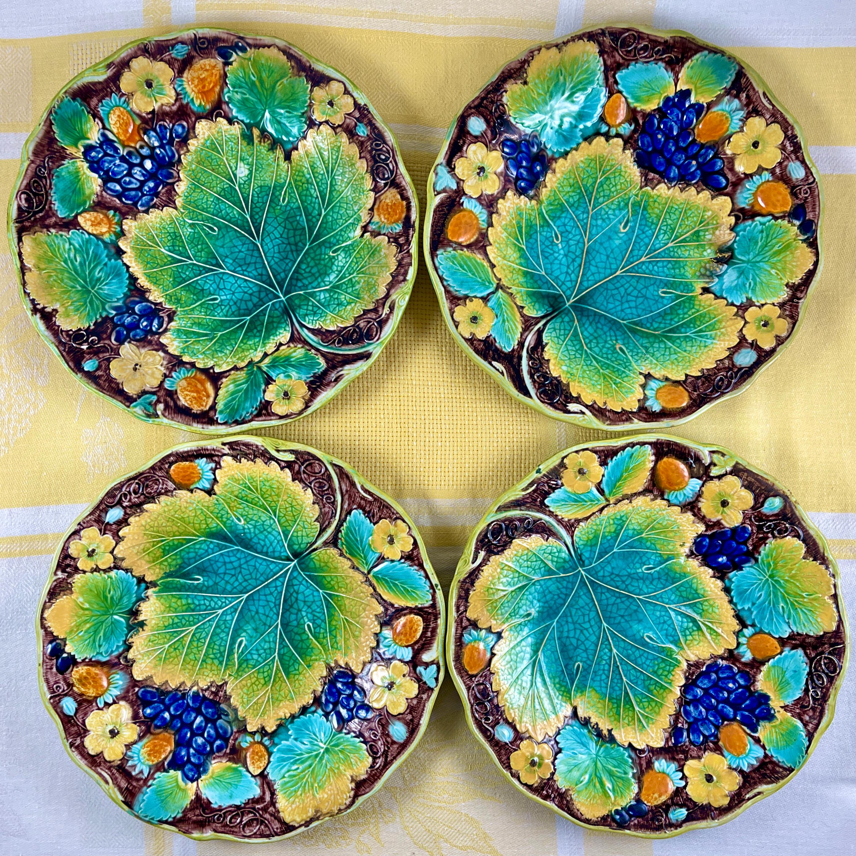 A strawberry and grape leaf plate, from Samuel Alcock & Co, Burslem, Staffordshire, England, circa 1850.

A central grape leaf is shown with a vine border, along with purple bunches of grapes and the berries and blossoms of the strawberry plant.