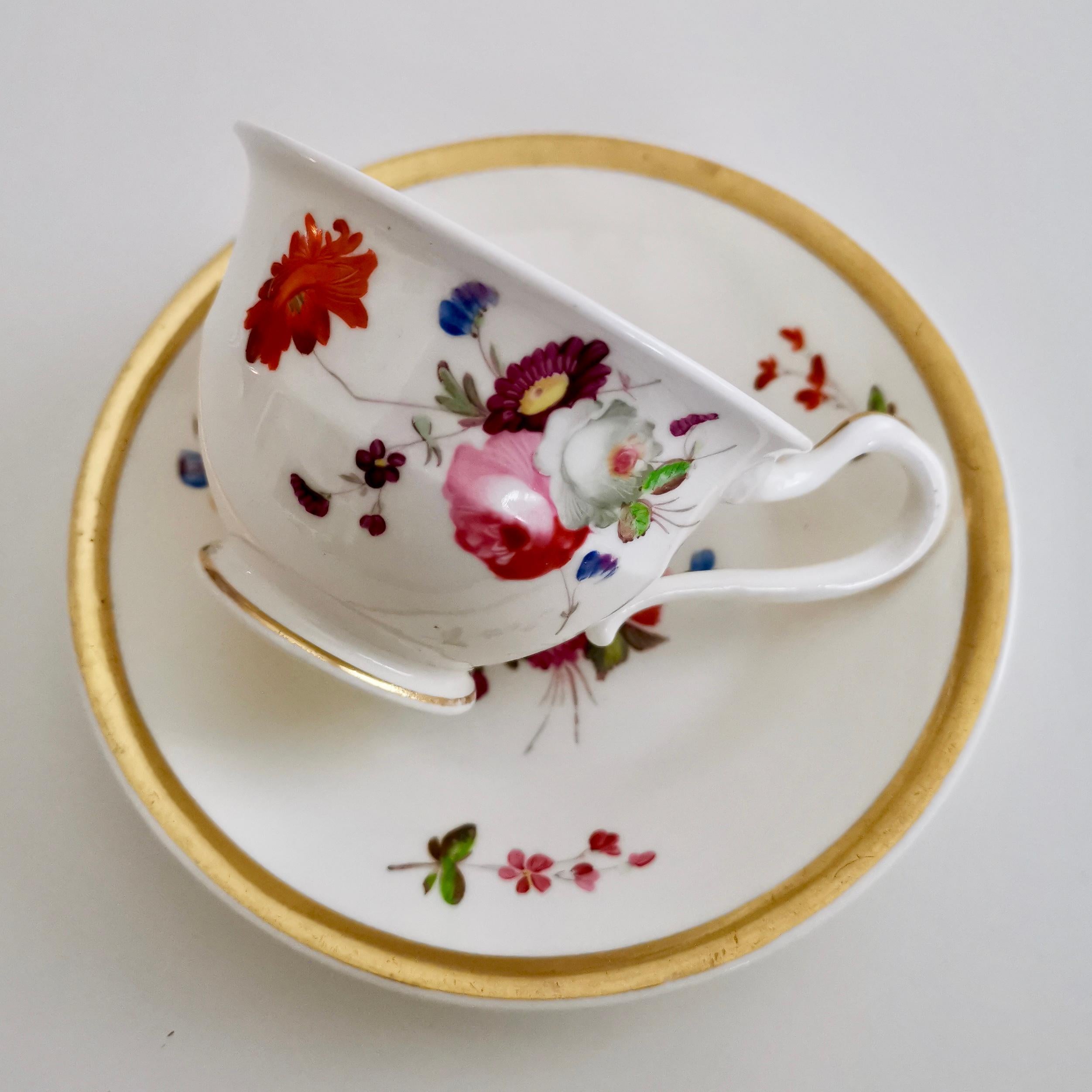 This is a beautifully decorated coffee cup and saucer made by Samuel Alcock, circa 1820. The cup is decorated in a style that closely resembles that of the Welsh Swansea factory, which was very popular at the time.

Samuel Alcock was one of the