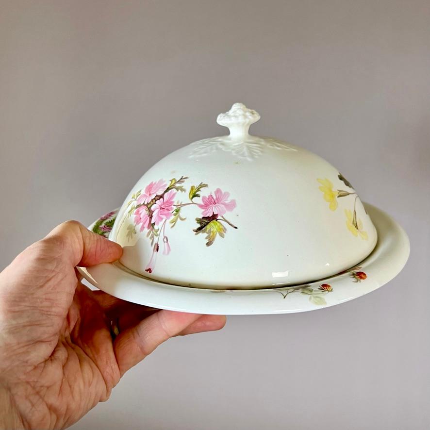 A muffin dish with cover, simple white ground with fruit basket finial surrounded by moulded acanthus leaves, with fine flower sprays and wild strawberries by William Pollard

Provenance: Sir Leslie Joseph collection. Joseph wrote a book on Swansea