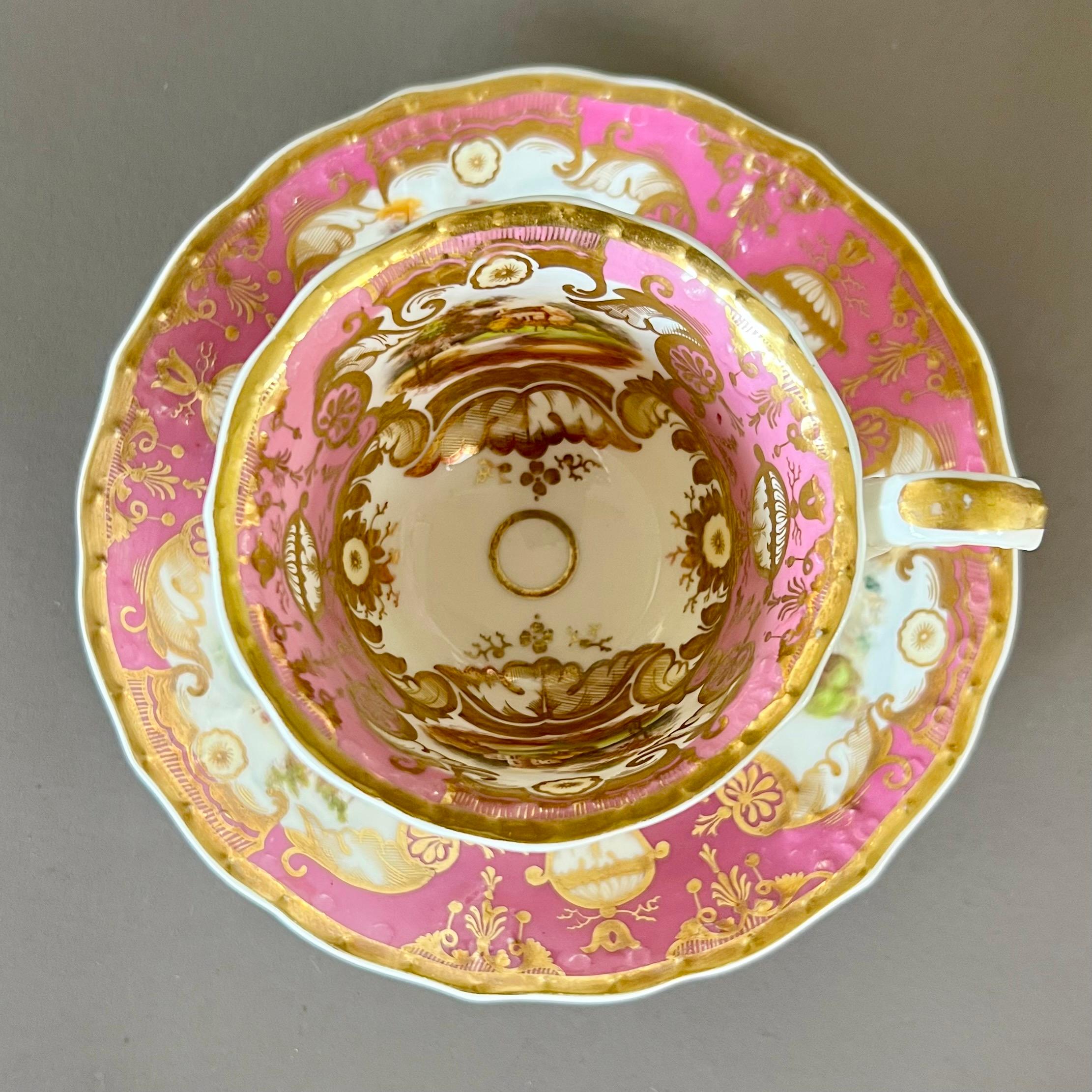Early 19th Century Samuel Alcock Porcelain Teacup Trio, Pink, Gilt and Sublime Landscapes, ca 1827