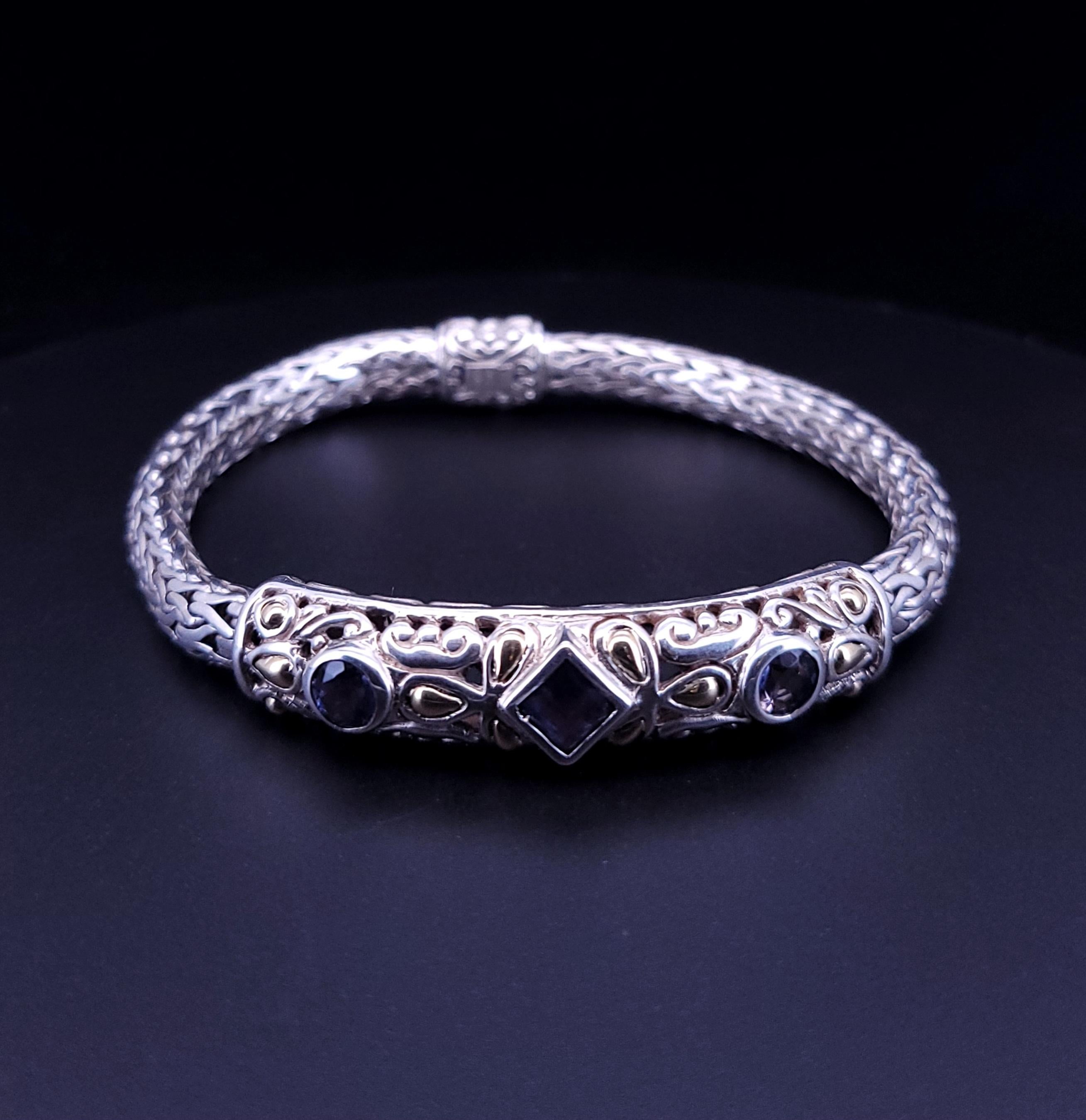 Samuel B Behnam woven chain 925 Sterling Silver 18k Yellow Gold Tanzanite bracelet
Bracelet:925 Silver 18k Yellow Gold
Stone: Tanzanite
Dimension center: 48 x 10 mm
Thickness 7.5 mm
Length: 8 ''
Chain Thickness 5.1 mm
Lock: Barrel clasp
Weight: 40.3